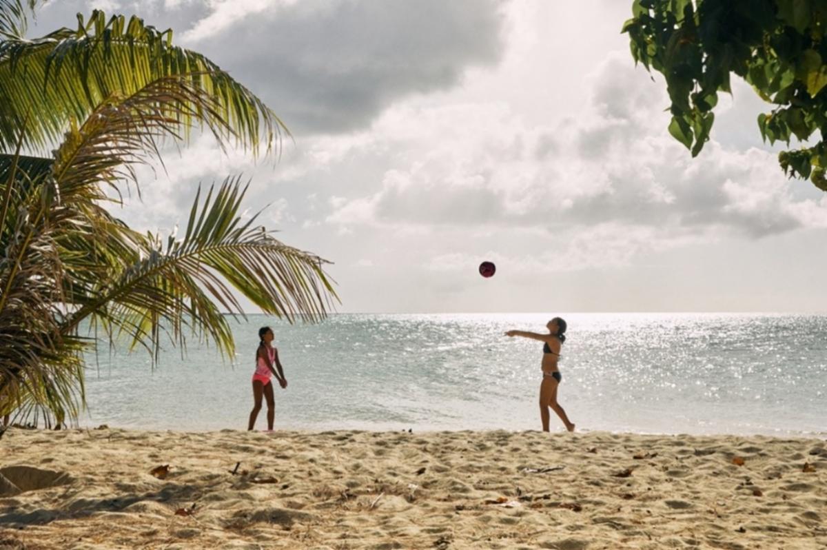 Children enjoy a relaxing time at the beach in Saipan, The Marianas.MVA photo