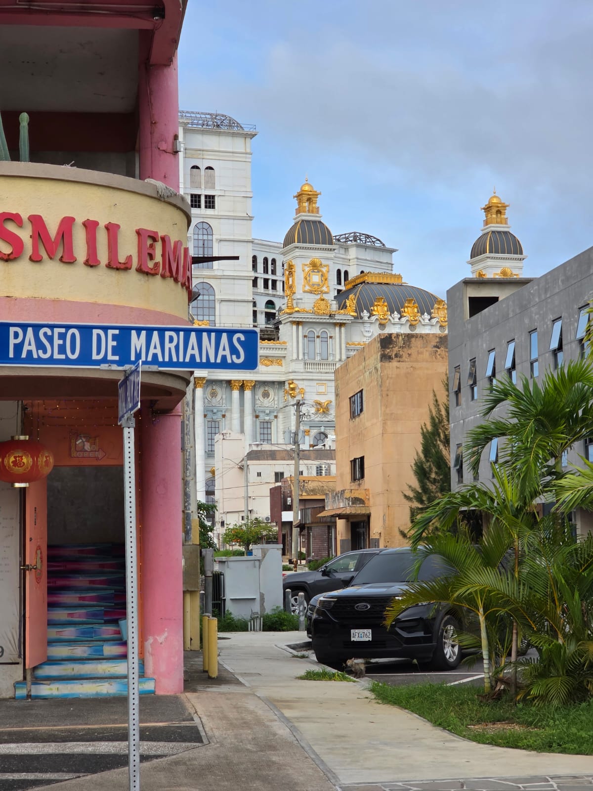 In the background, IPI’s unfinished hotel-casino stands between buildings in downtown Garapan.Photo by Bryan Manabat