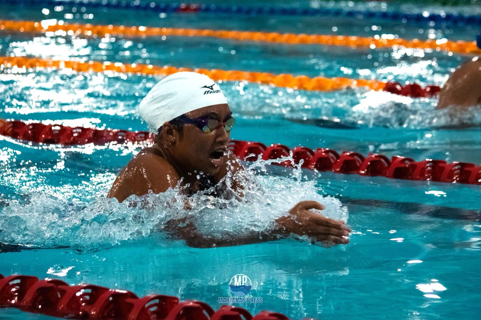 Maria Batallones on her way to a bronze medal finish in the 200m breaststroke event.Marianas Press via NMSA