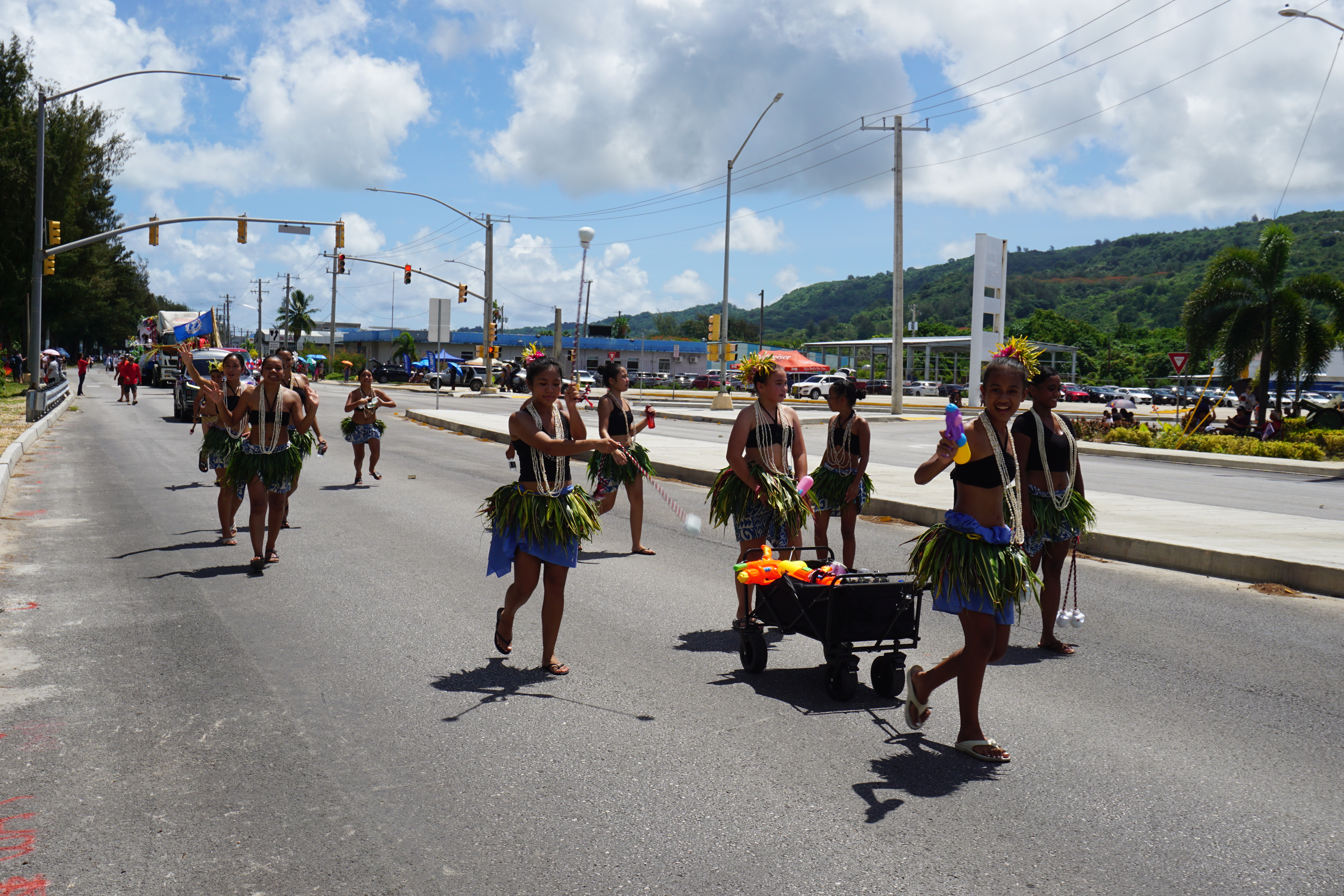 Young Polynesian cultural dancers join the parade.