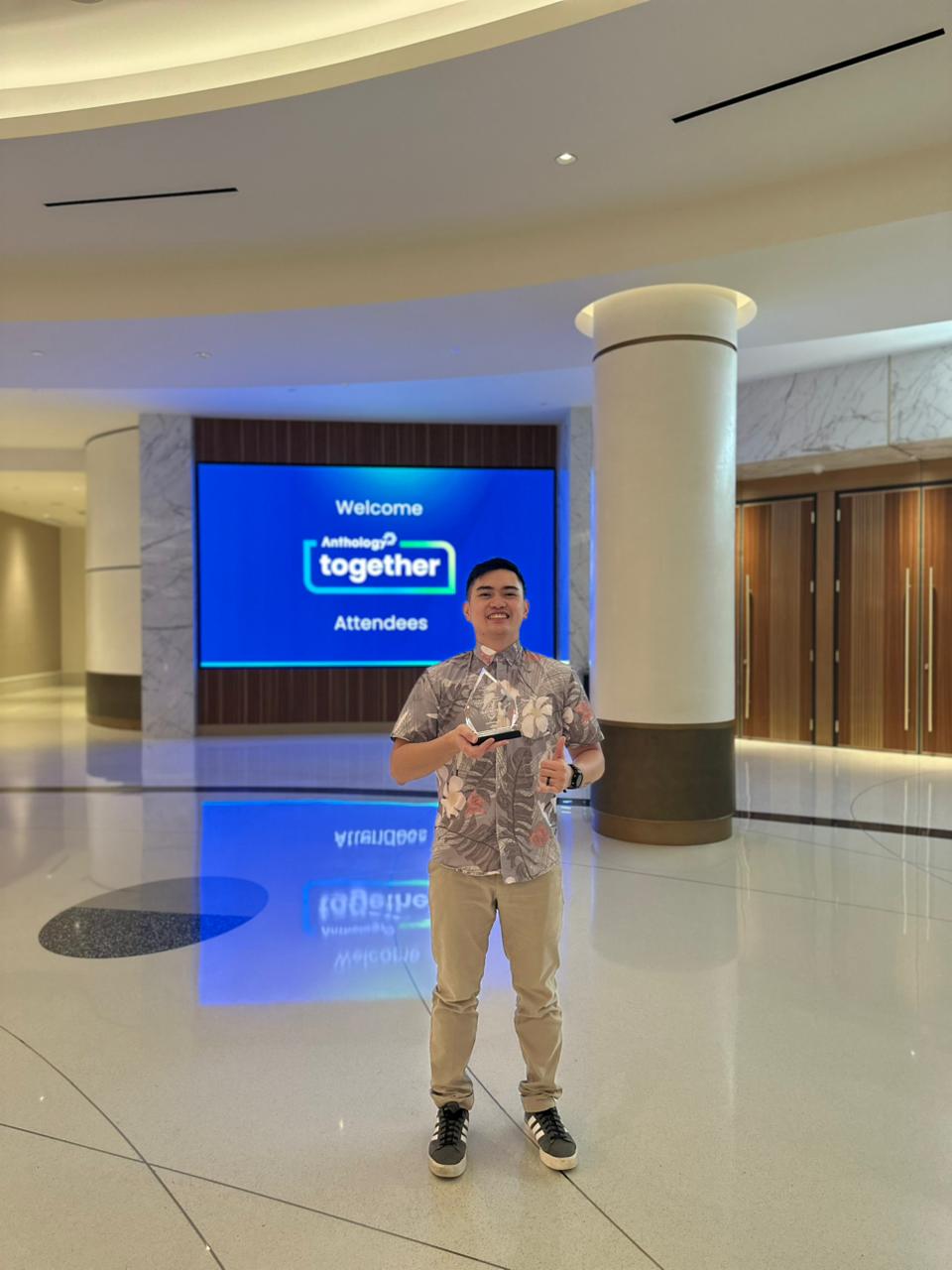 Kevin Anthony De Torres receives the Catalyst Award on behalf of the PSS Instructional Technology and Distance Education Program and program instructors, staff and public education stakeholders.