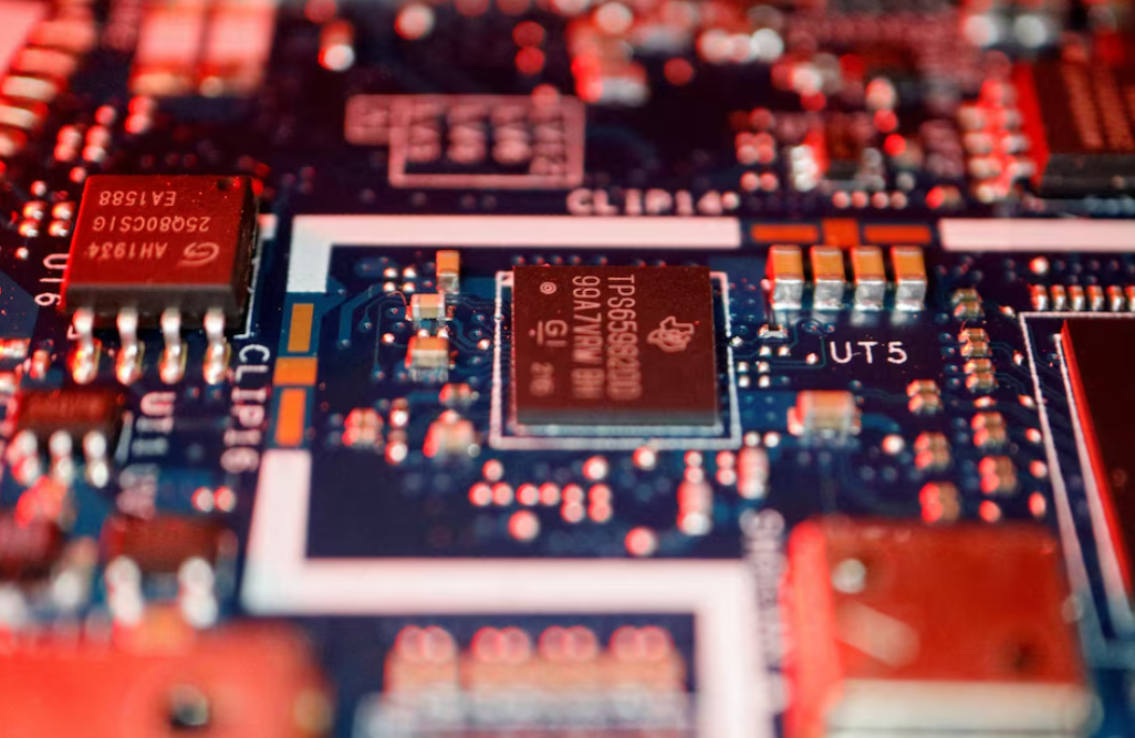Semiconductor chips are seen on a circuit board of a computer in this illustration picture taken on Feb. 25, 2022.REUTERS