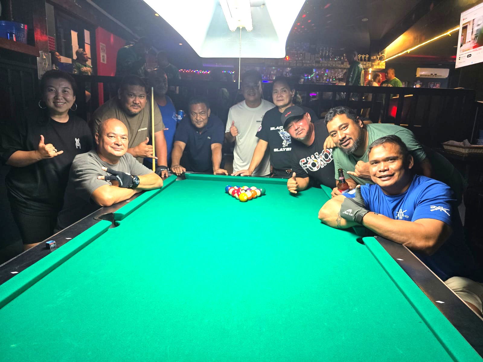 Black 8 Crooked Arrow and Black 8 Rack N Roll players pose for a group photo after completing a match in the Thursday division of the 2025 SBA Budweiser Open 8-Ball League at the Black 8 Pool Bar.Contributed photo