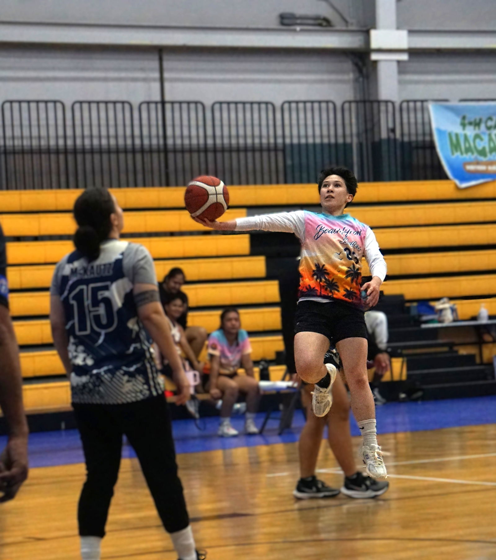 The Beach Front Ballers’ Gia Hemley extends for a layup during a game against the Hericanes in the Ladies Division of the 2025 Allied Pacific Environmental Consulting Basketball League at the gym on Monday night.Photo by James F. Sablan Jr.