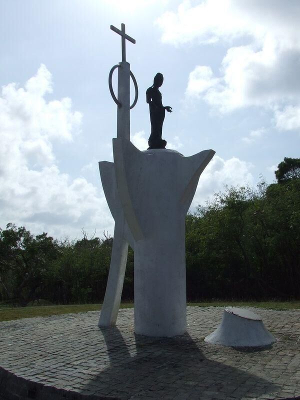 The peace memorial and copper deity statue at Suicide Cliff in Marpi, Saipan.