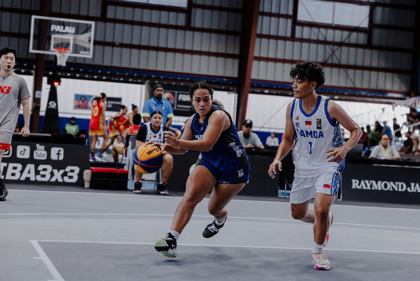 The NMI’s Kina Rangamar, left, tries to dribble past a Samoa defender during their 3x3 game in the 2025 Pacific Mini Games in Palau early this month.ANOC photo