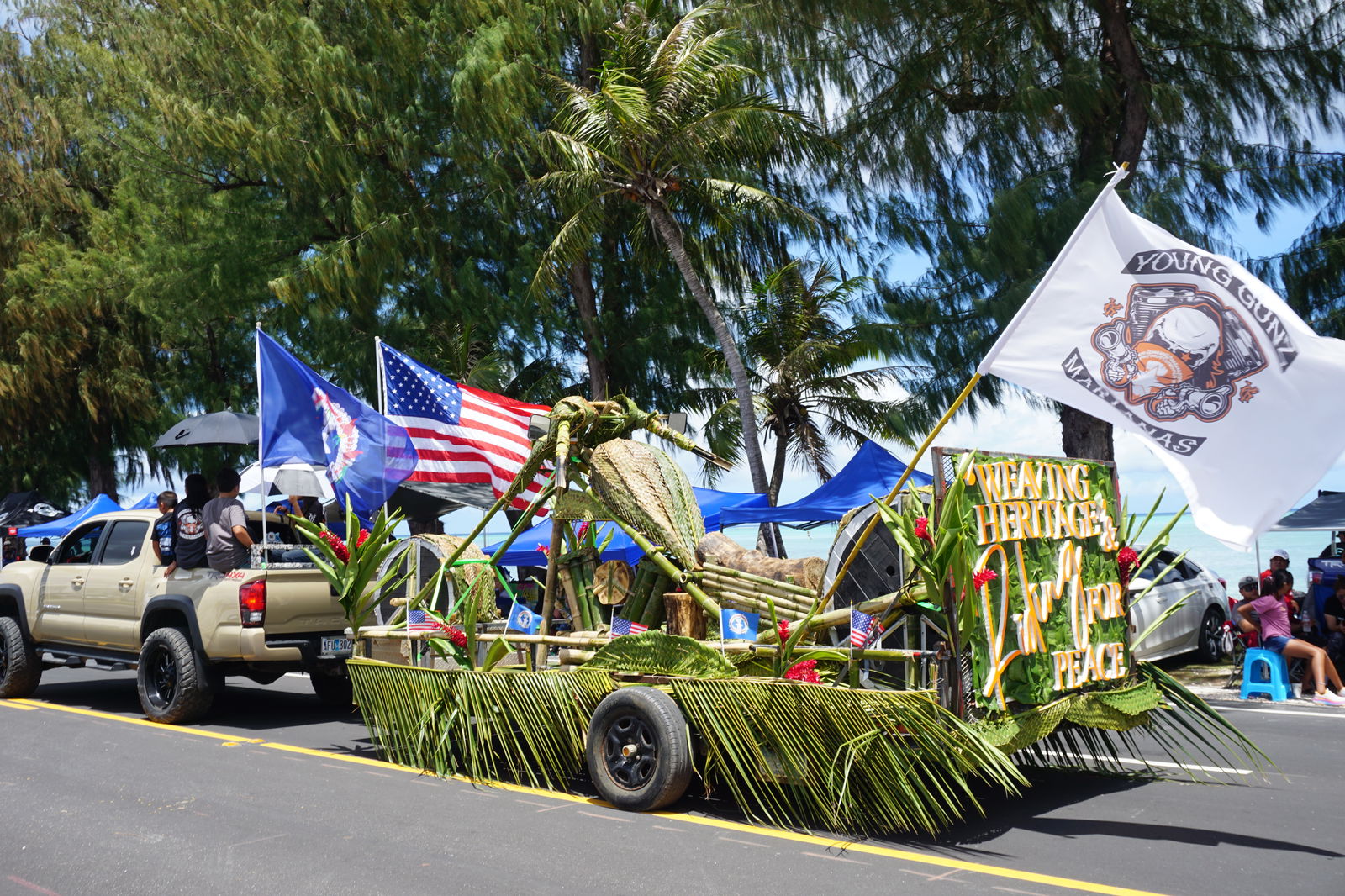 The Young Gunz Motorcycle Club's float featured a motorcycle model made of woven palm leaves and bamboo.