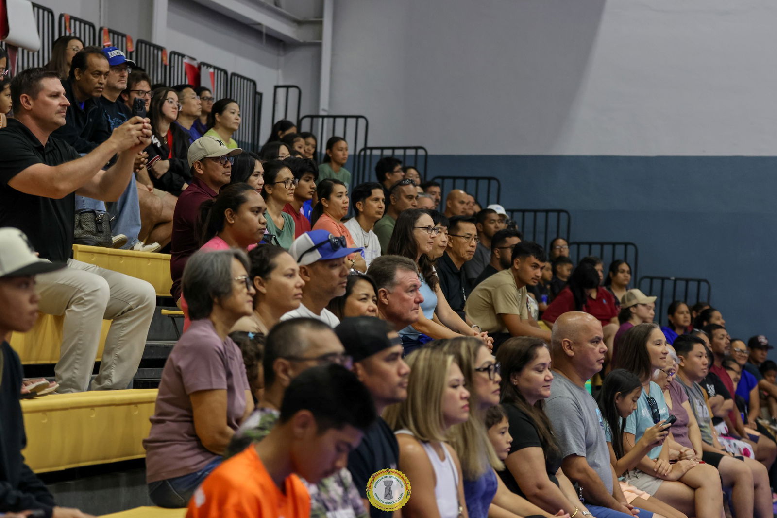 Team Marianas supporters gather at the Gilbert C. Ada Gymnasium during the send-off ceremony for the NMI delegation last month. The NMI community continued to support their athletes by watching the livestreaming of the competitions in the 2025 Pacific Mini Games in Palau and sending messages to the teams.Marianas Press photo