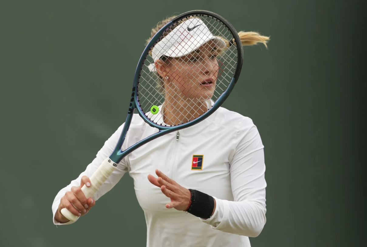 Anna Kalinskaya of Russia prepares to return to Clara Tauson of Denmark during their second round women’s singles match at the Wimbledon Tennis Tournament in London on July 3, 2025.AP
