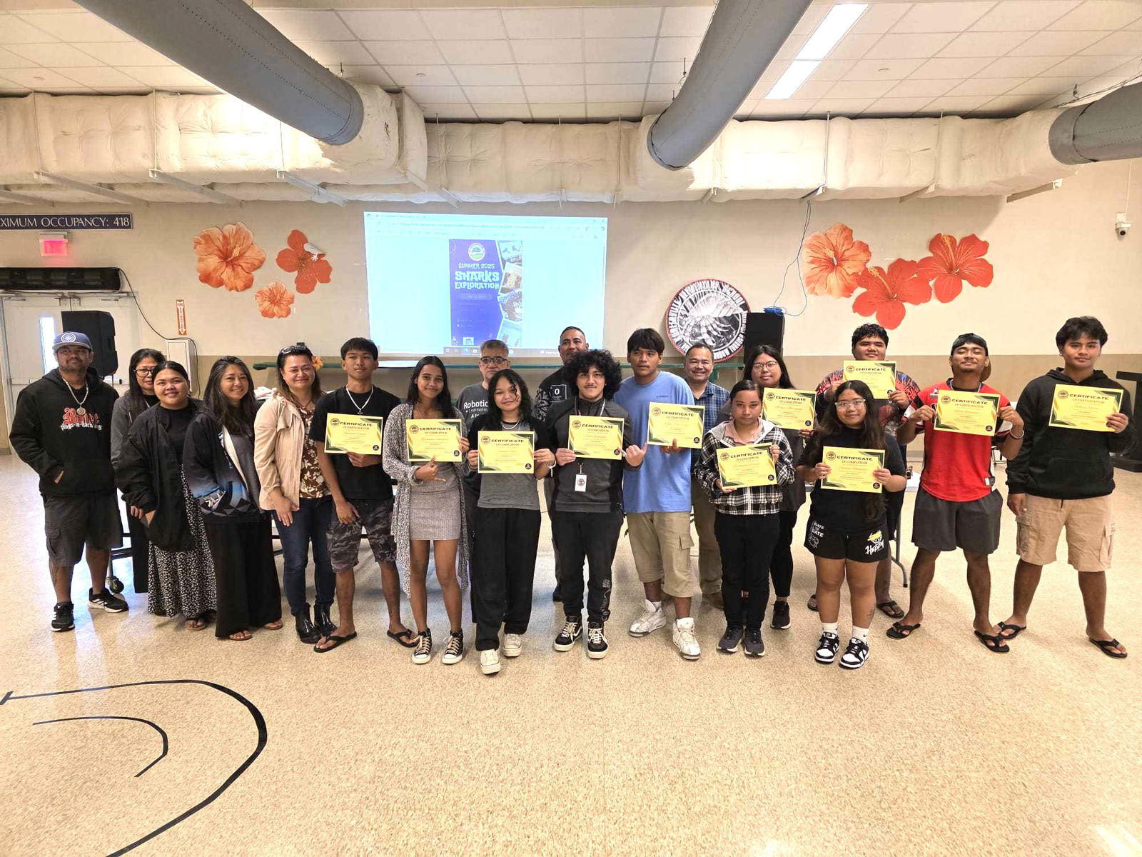 Daok Academy students hold their certificates after completing the Summer 2025 Sharks Exploration on STEM Robotics and Project Discovery.Photo by Emmanuel T. Erediano