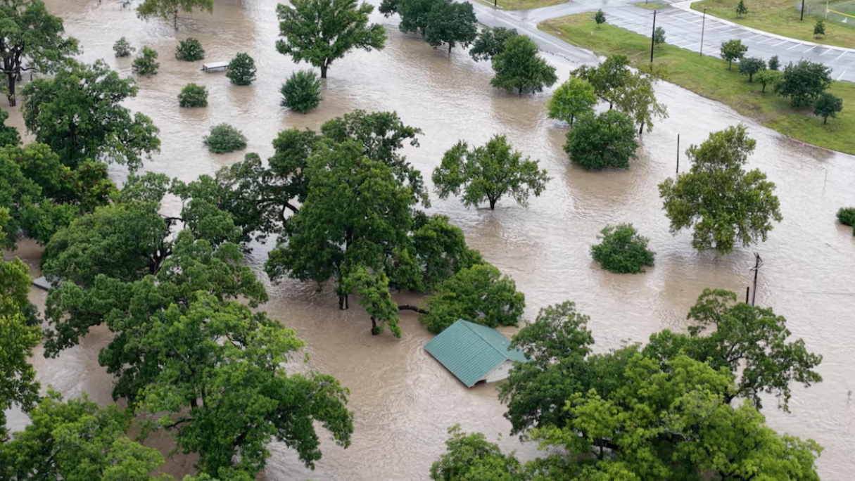 A drone view shows an area flooded by the swollen San Gabriel river, in Georgetown, Texas, July 5, 2025 in this screen grab from social media video.Adam Grumbo/via REUTERS