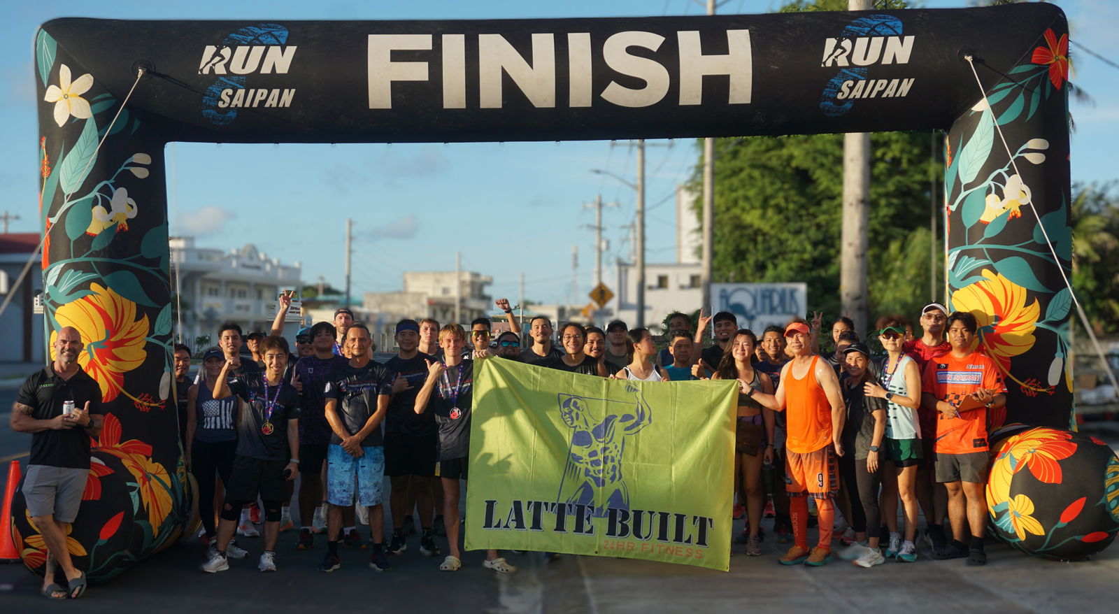 Race participants pose for a group photo after completing the 5th Annual Latte Built 4th of July Independence Day 2-Miler at the Latte Built Gym on July 4, 2025.Photo by James F. Sablan Jr.
