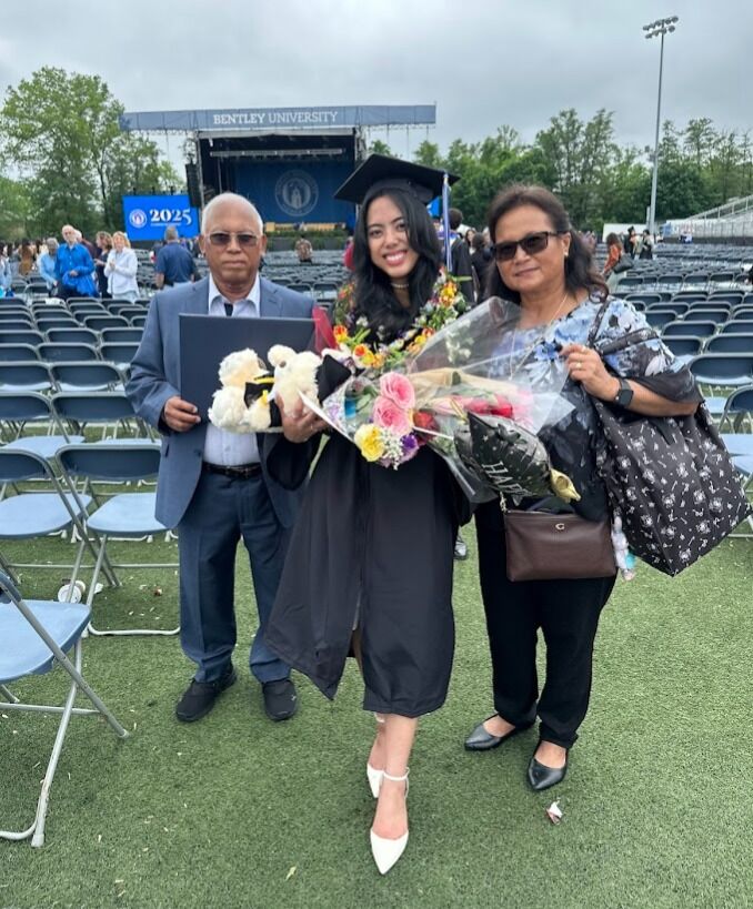 Maria Ayuyu with parents Joe and Marcia Ayuyu.