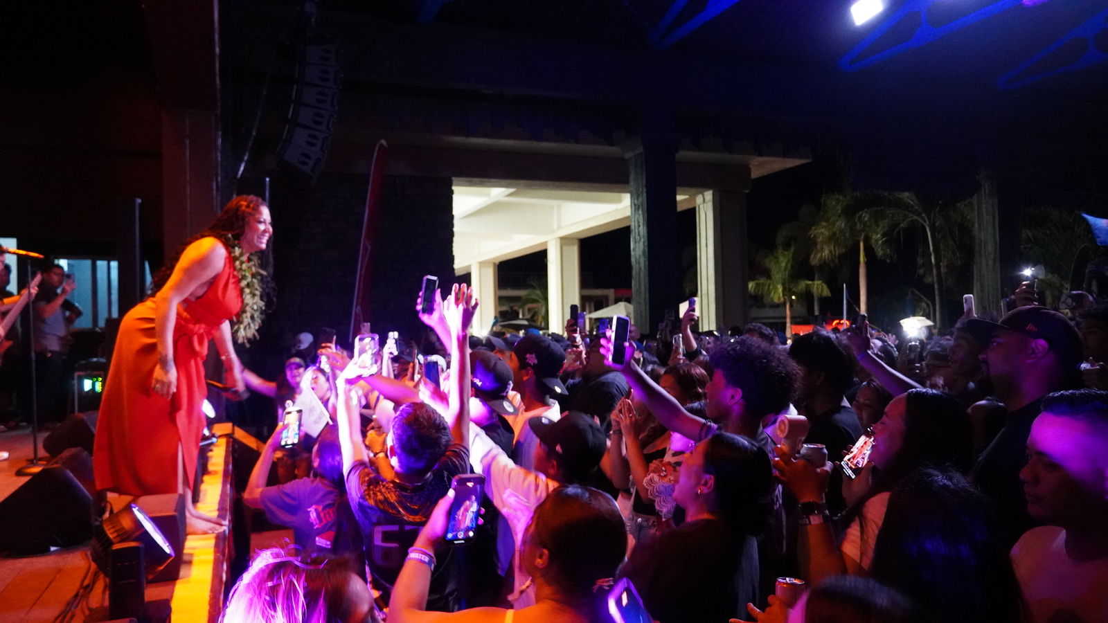 Island residents show Tenelle how much they've missed her.