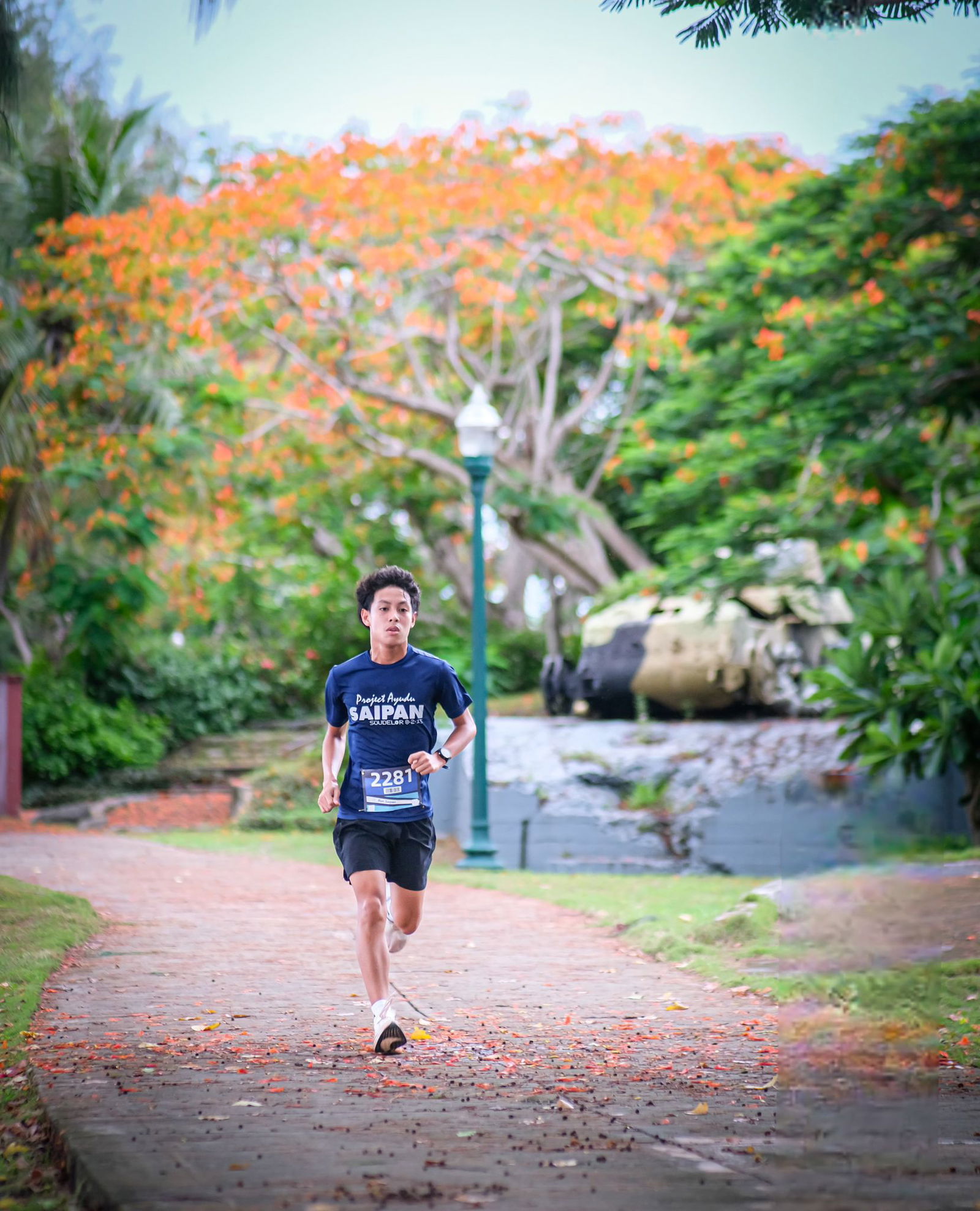 Victor Nash Santos passes the turnaround point as he leads the inaugural Roll Out 5K, hosted by the Commonwealth Office of Transit Authority and Run Saipan on Wednesday afternoon at Garapan Fishing Base.Photo by Jonathan Sugatan
