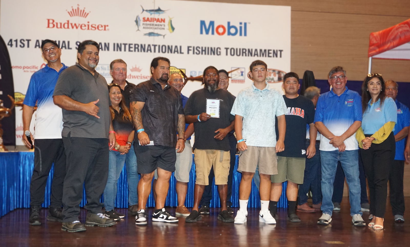 Ava Rose crewmembers pose alongside SFA board members as the first-place winner in the Skipjack/Katsu category during the awards banquet for the Saipan Fishermen's Association's 41st Saipan International Fishing Tournament at the Taga Hall of Saipan World Resort on Monday night.