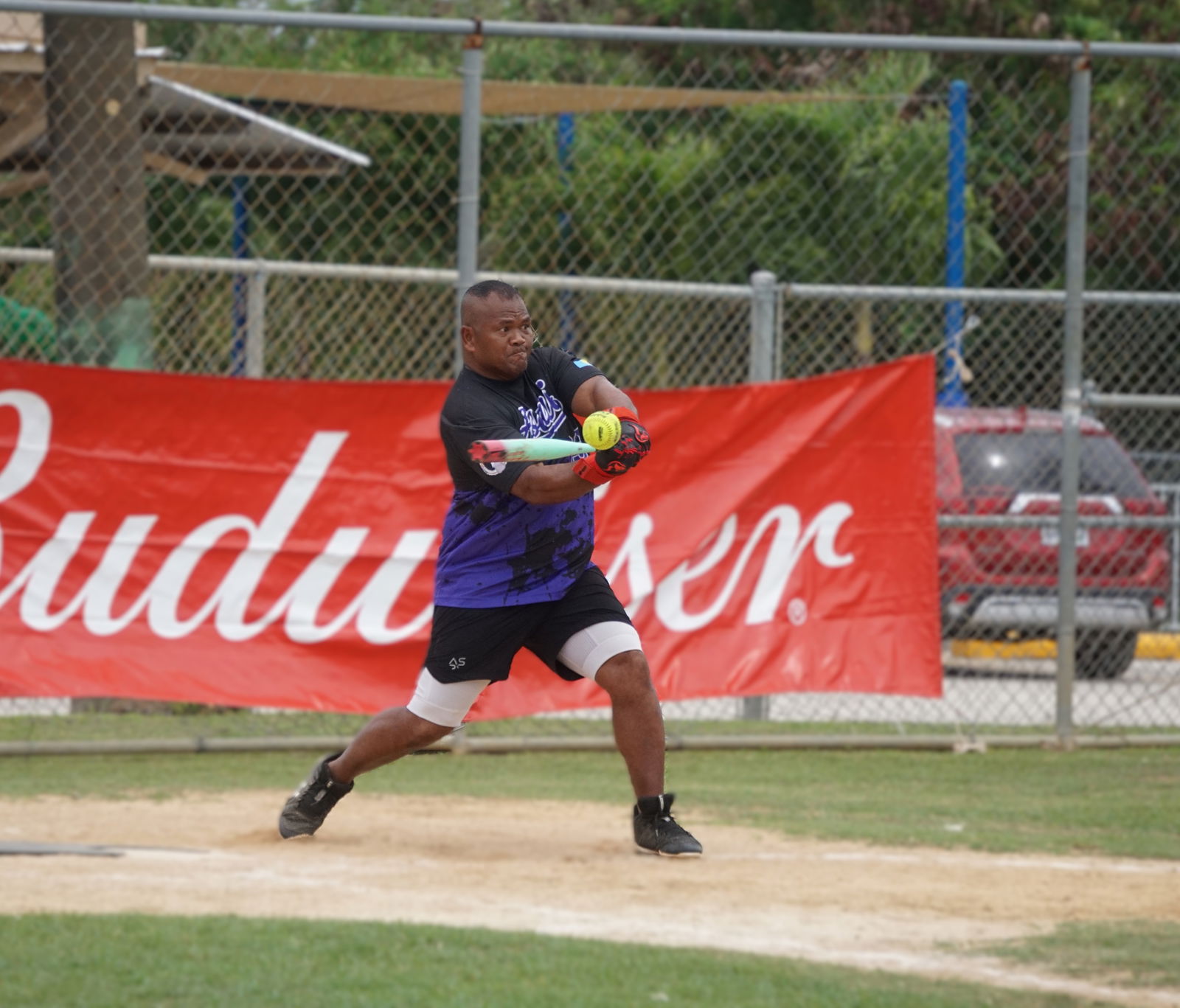 Asahi's Dom Hideo connects a double during a game in the masters division of the 2025 Budweiser Belau Amateur Softball Association League at the Dandan ball field.Photo by James F. Sablan Jr.