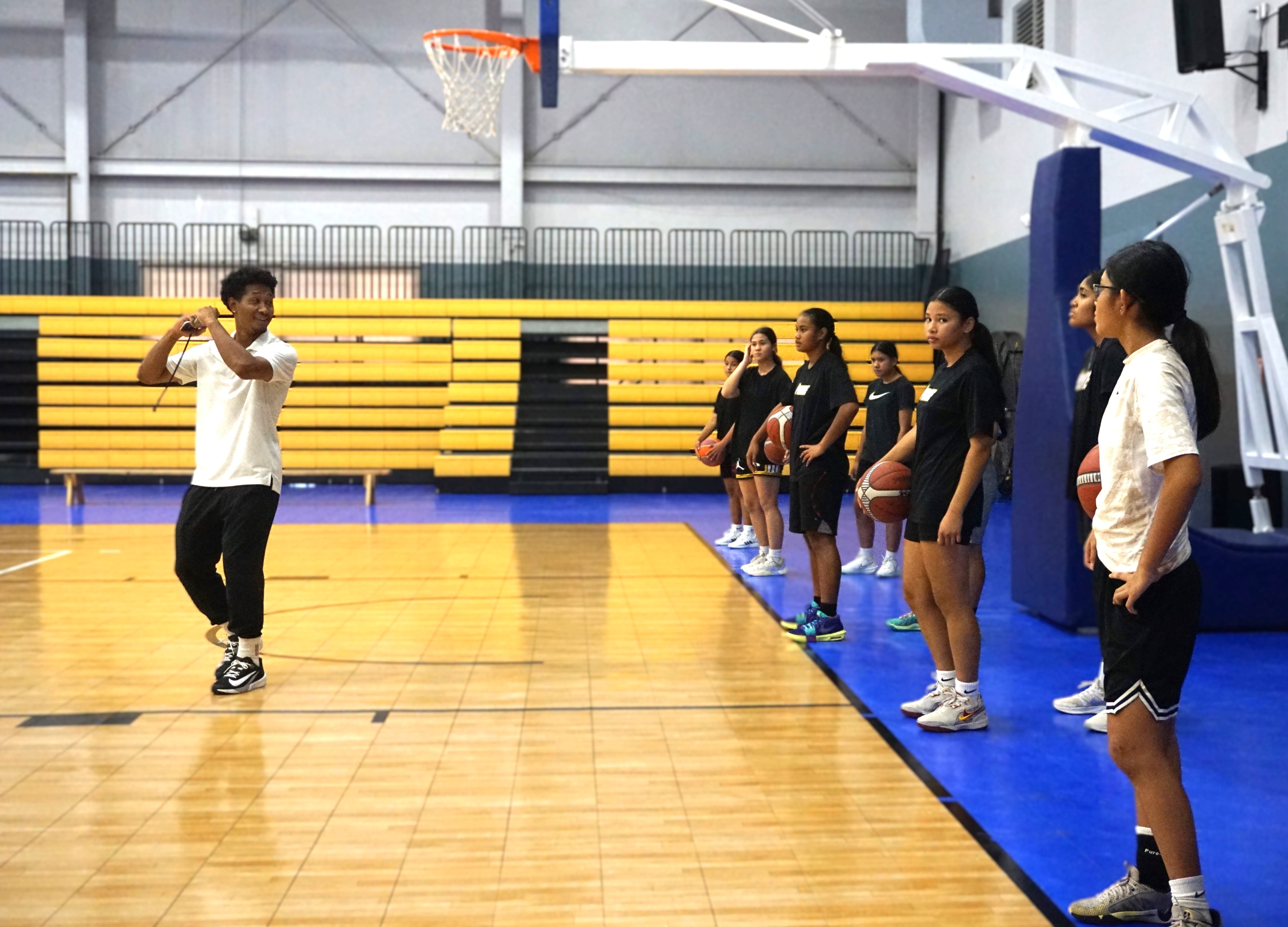 Morgan Hikaru Aiken IV (not VI as earlier reported), owner of Grind Basketball Guam, executes drills with participants of the two-day Saipan Training Camp held on July 8 and 9 at the Ada gym.