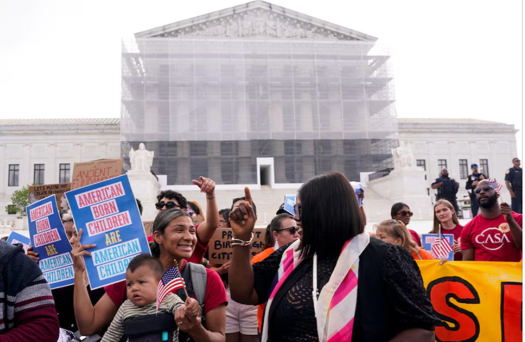 Demonstrators rally on the day the Supreme Court justices hear oral arguments over President Donald Trump's bid to broadly enforce his executive order to restrict automatic birthright citizenship, during a protest outside the U.S. Supreme Court in Washington, D.C., May 15, 2025.REUTERS