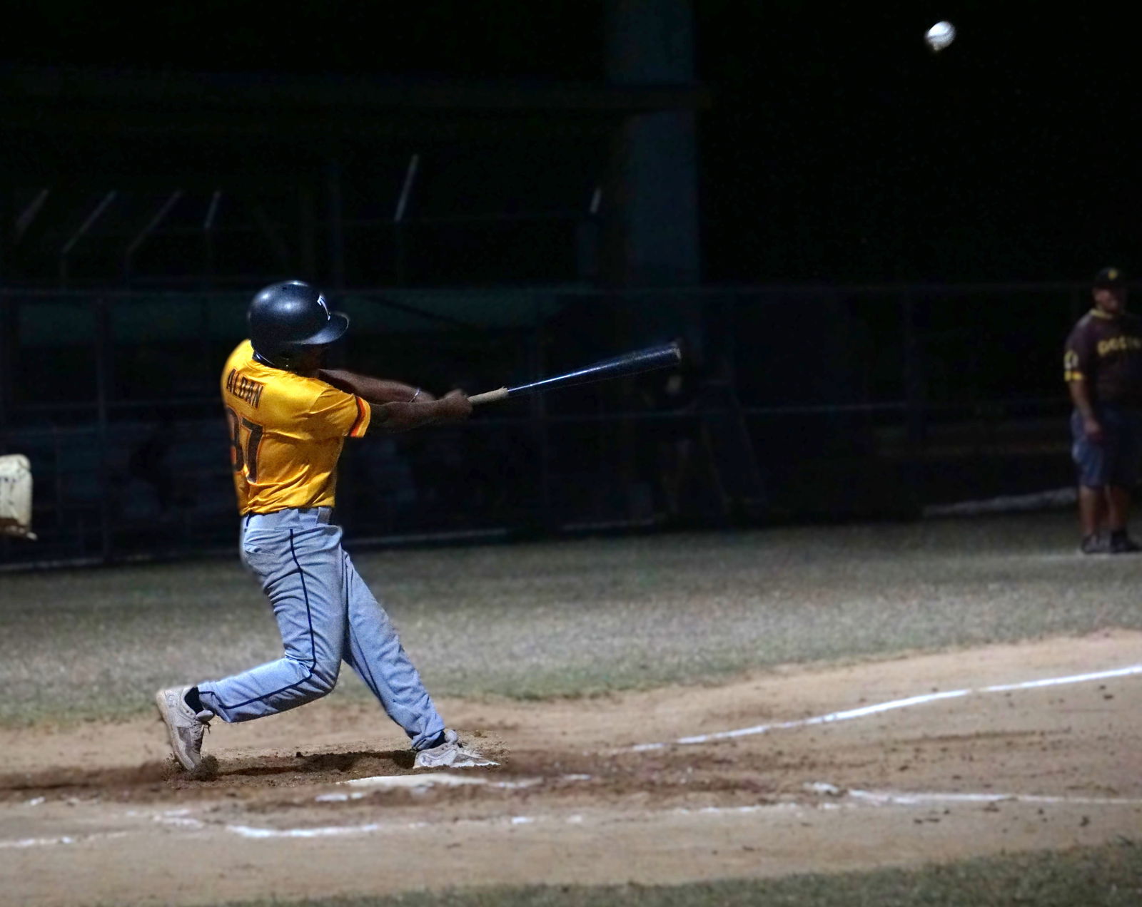 The Padres' MJ Aldan hits a line drive to left field during a Saipan Baseball League game at the Francisco "Tan Ko" Palacios Baseball Field.Photo by James F. Sablan Jr.