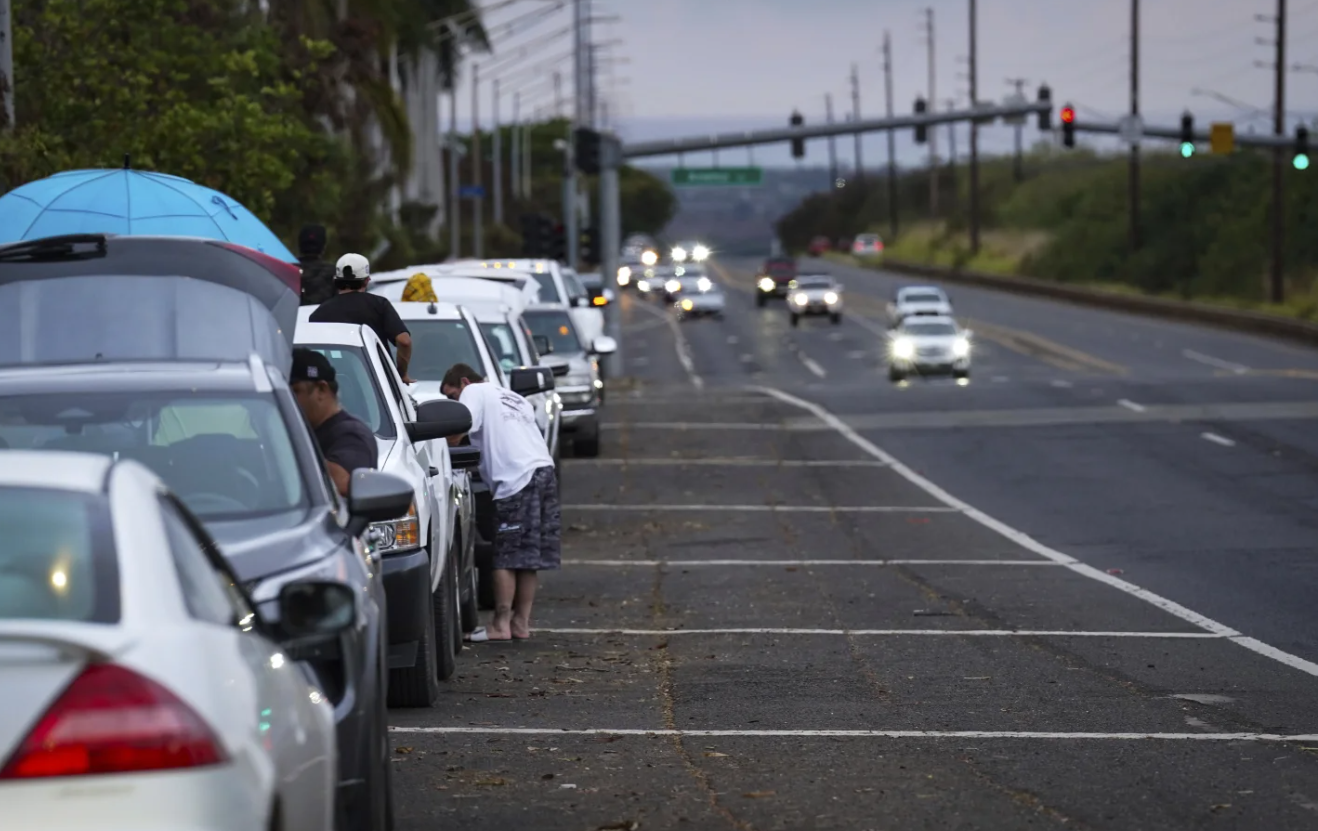 Oahu residents evacuate Ewa Beach to the side of Kunia Road due to the threat of tsunami in Kapolei, Oahu, Hawaii, Tuesday, July 29, 2025.AP