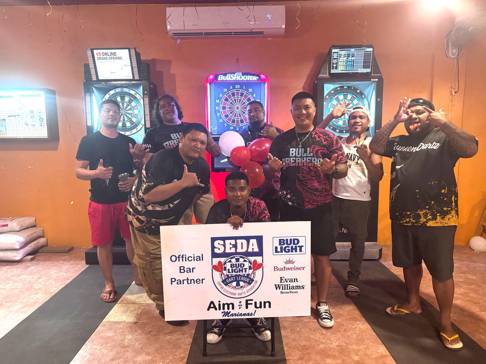 Tom Yum Bull Breakers and Tom Yum Drunken Dartz pose for a group photo after their match in the A Division of the 2025 SEDA Bud Light Dart League at the Tom Yum Restaurant in San Antonio on Monday night.Contributed photo