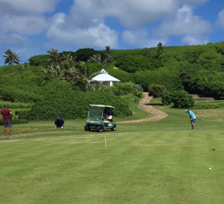 James Taitano at hole 6. He chipped his ball, and it went straight into the hole, earning him a birdie.
