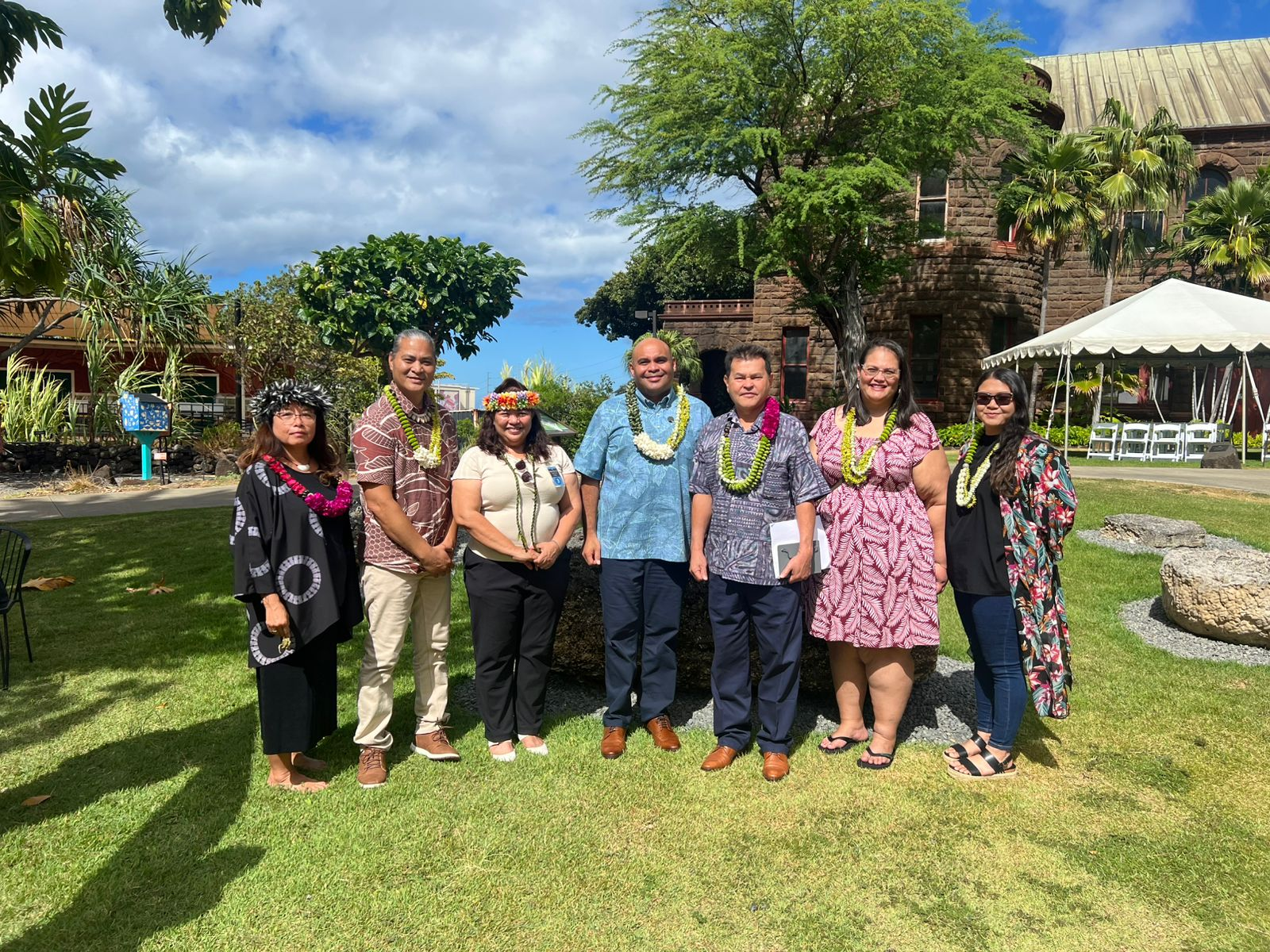 Leonard Leon, 2nd left, Saipan Sen. Celina Babauta, 3rd left, Guam Lt. Gov. Josh Tenorio, center, CNMI Office of the Governor Chief of Staff Henry Hofschneider, 3rd right, on the campus of the Bishop Museum.