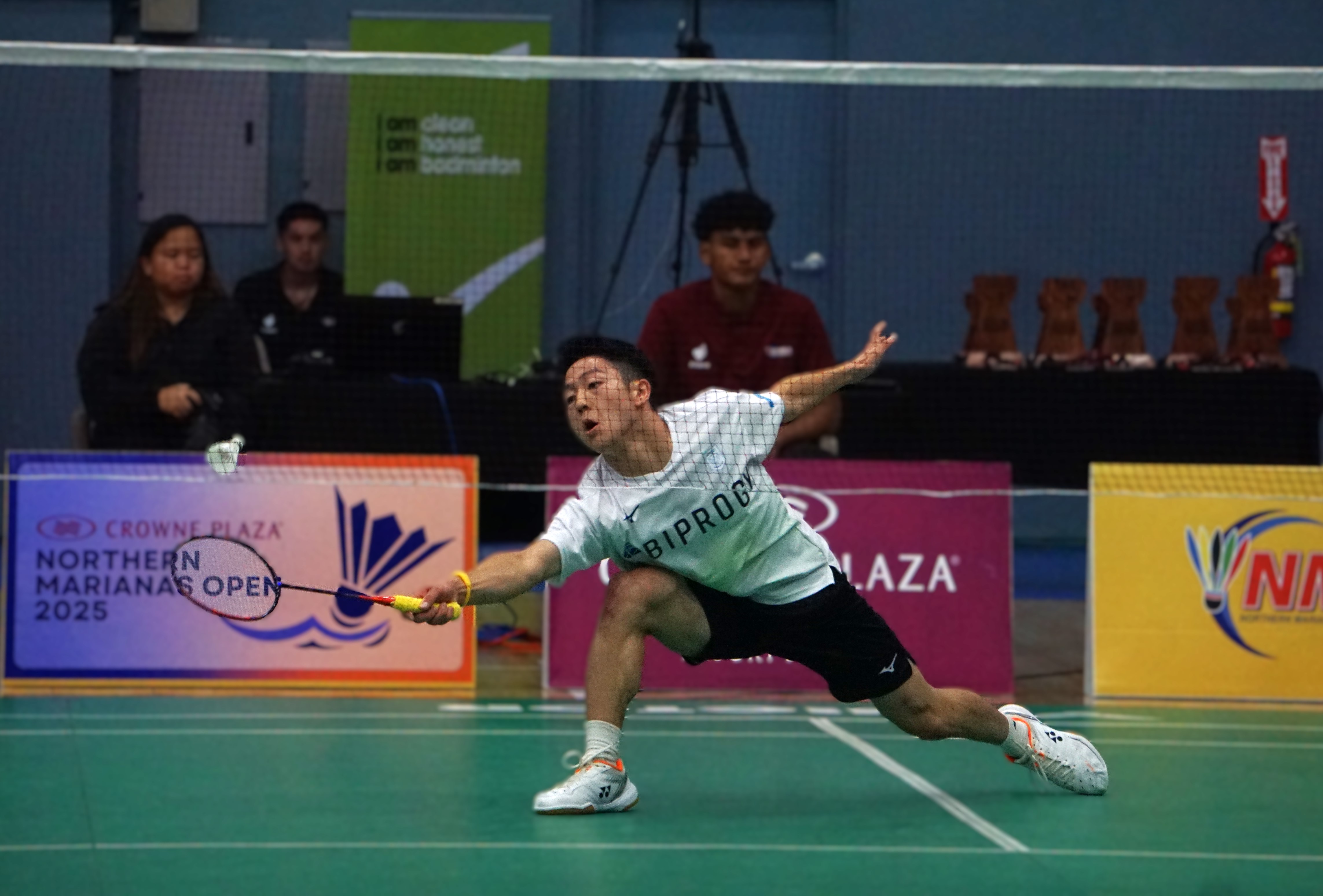 Japan's Yudai Okimoto extends for the save during the title match against South Korea's Hae Duen Kim in the Men's Singles event of the Crowne Plaza Northern Marianas Open 2025 at the Ada gym on Sunday.