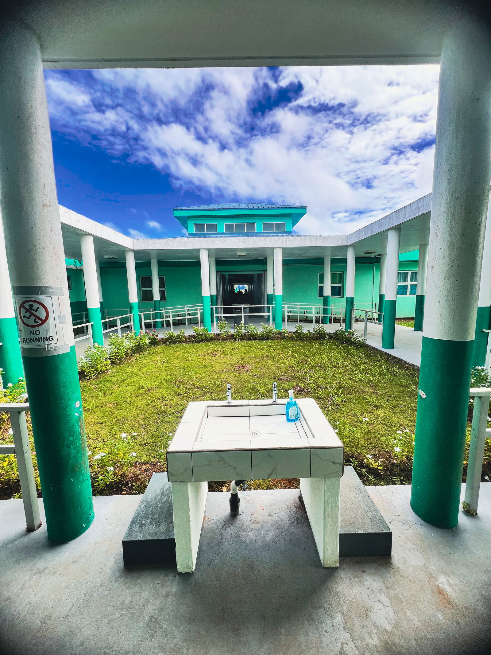 Facilities at Sinapalo Elementary School were cleaned and prepared for the new school year, including the water fountain pictured in the foreground.
