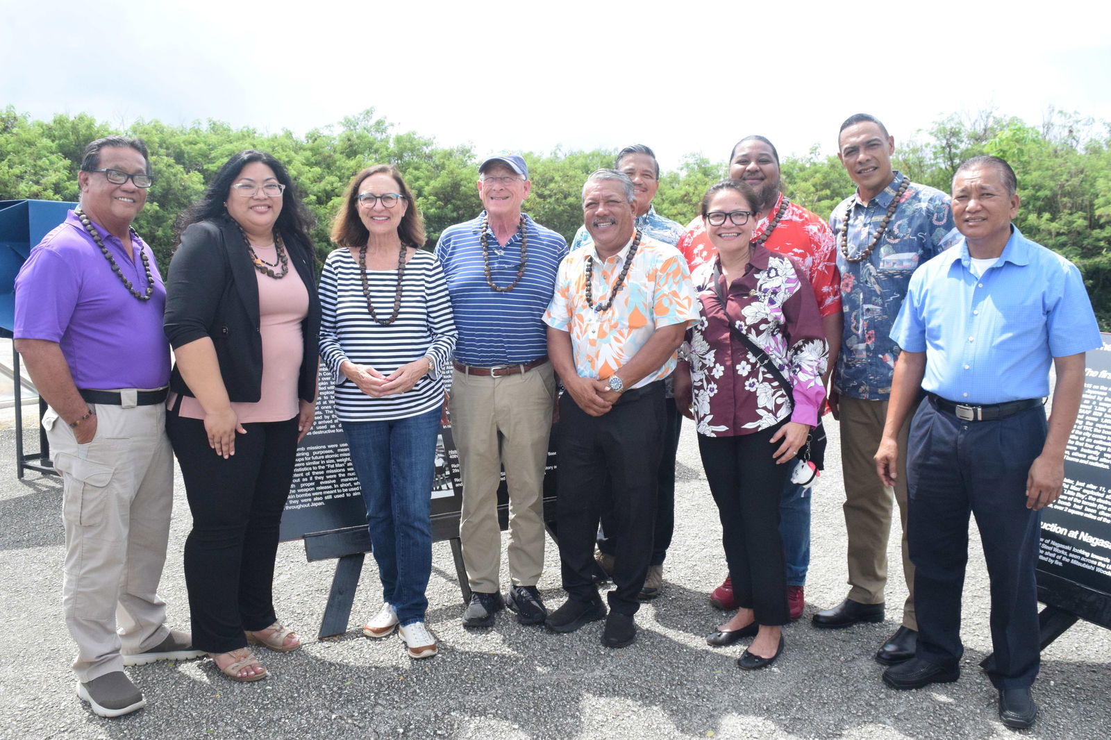 U.S. Sen. Roger Wicker, fourth from left, and U.S. Sen. Deb Fischer, third from left, pose for a photo with CNMI officials at a World War II bomb pit on Tinian’s North Field during their visit on Monday.Photo by Emmanuel T. Erediano