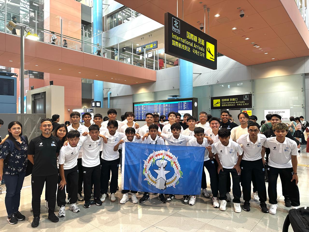 The NMI U23 Men's National Team members pose for a group photo after arriving in Osaka, Japan.NMIFA photo