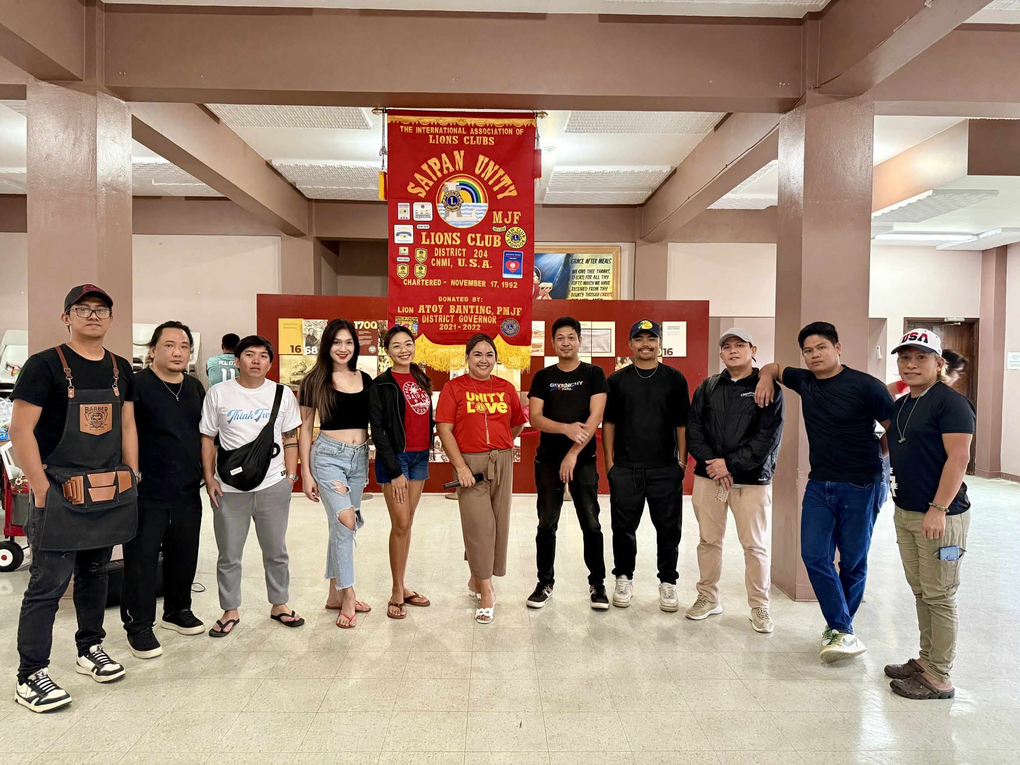 Saipan Unity Lions Club President Lion Angel Lastimado, center, with volunteer barbers and hairdressers.