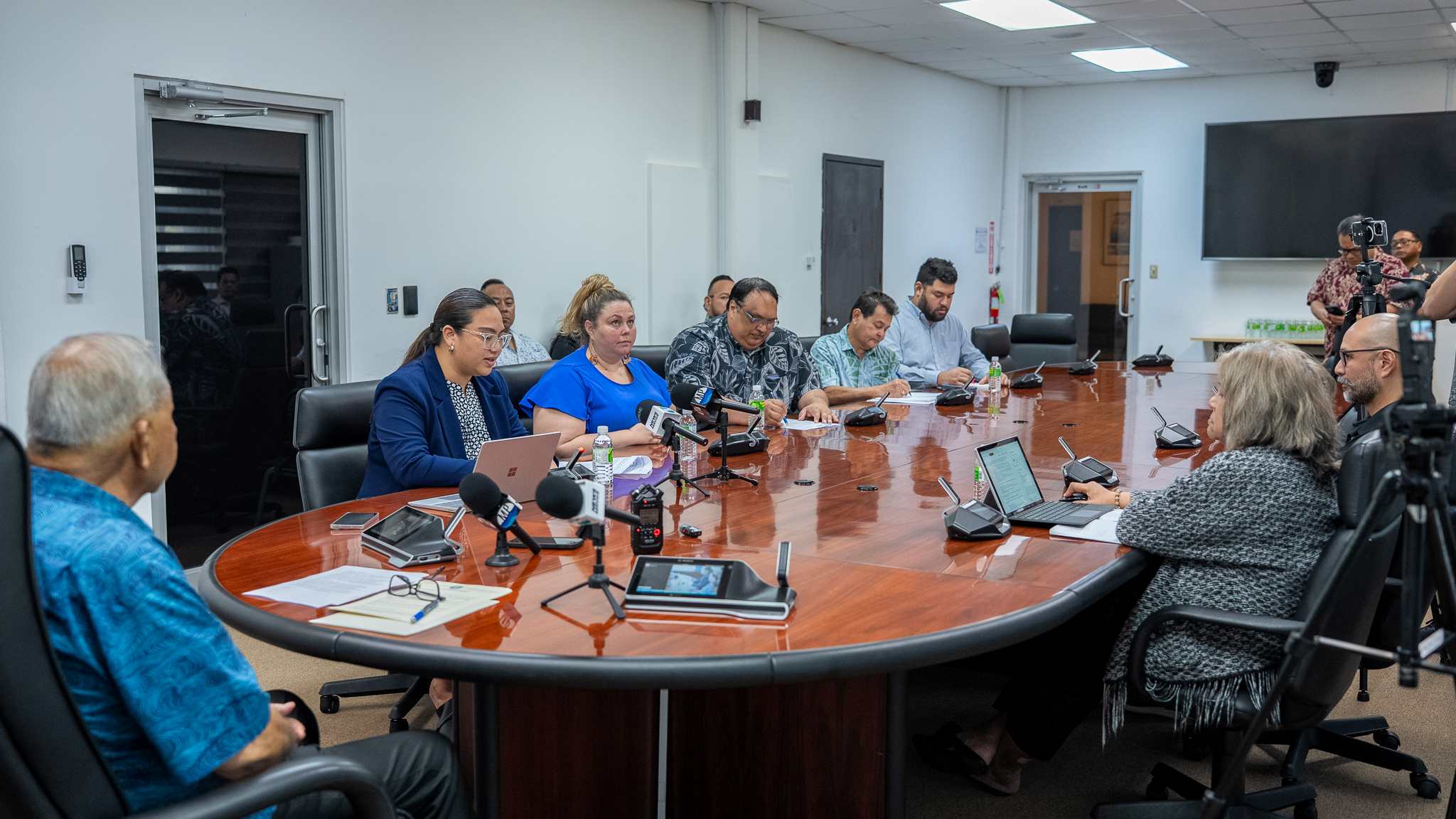 Finance Secretary Tracy B. Norita, second left, delivers her remarks prior to the singing of Executive Order 2025-003, as Gov. David M. Apatang, left, and other CNMI officials look on.Office of the Governor photo