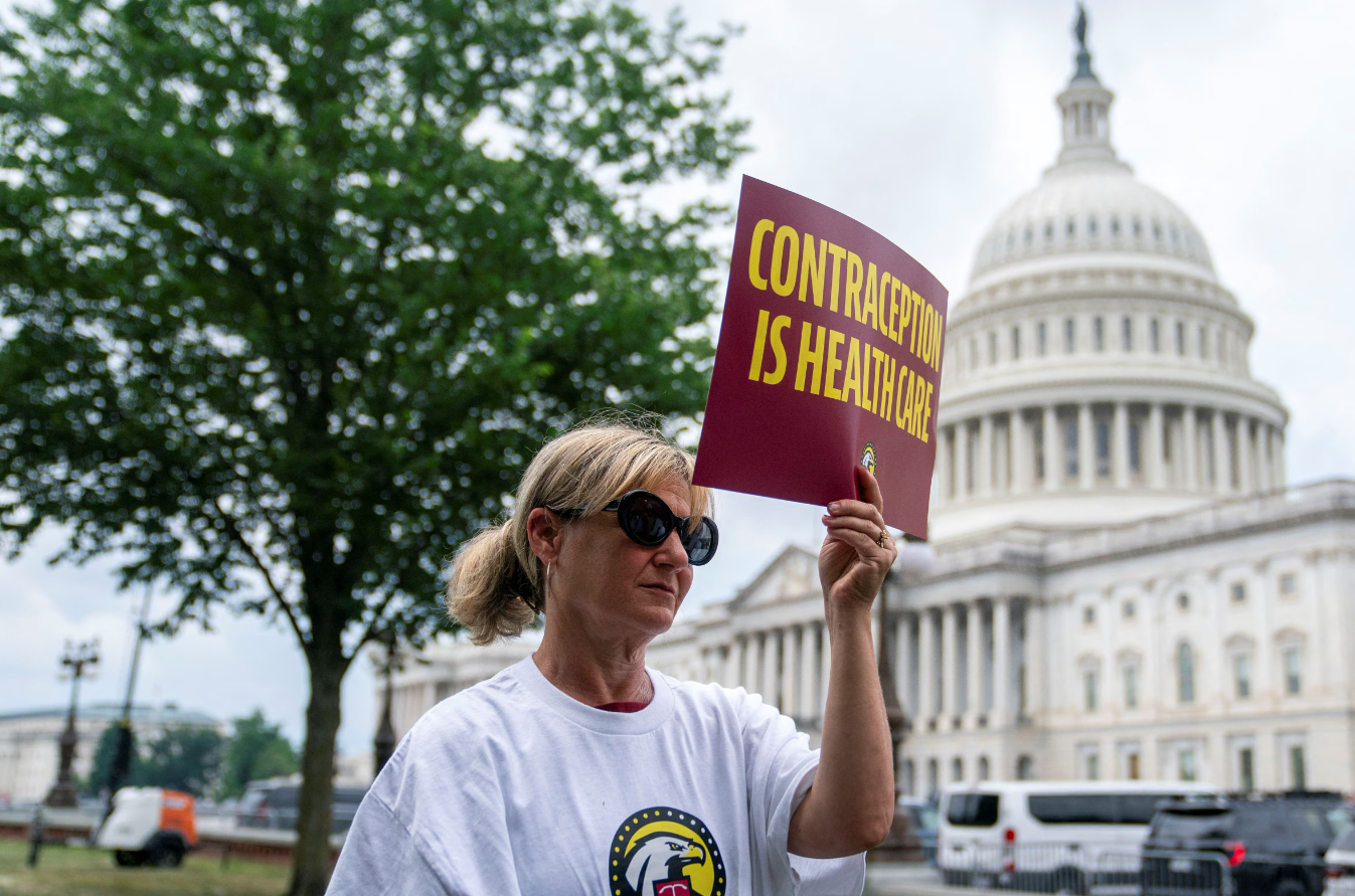 A member of Americans for Contraception listens to U.S. Senate leaders speak during a press conference supporting the "Right to Contraception Act" on Capitol Hill, Washington, D.C., June 5, 2024.REUTERS