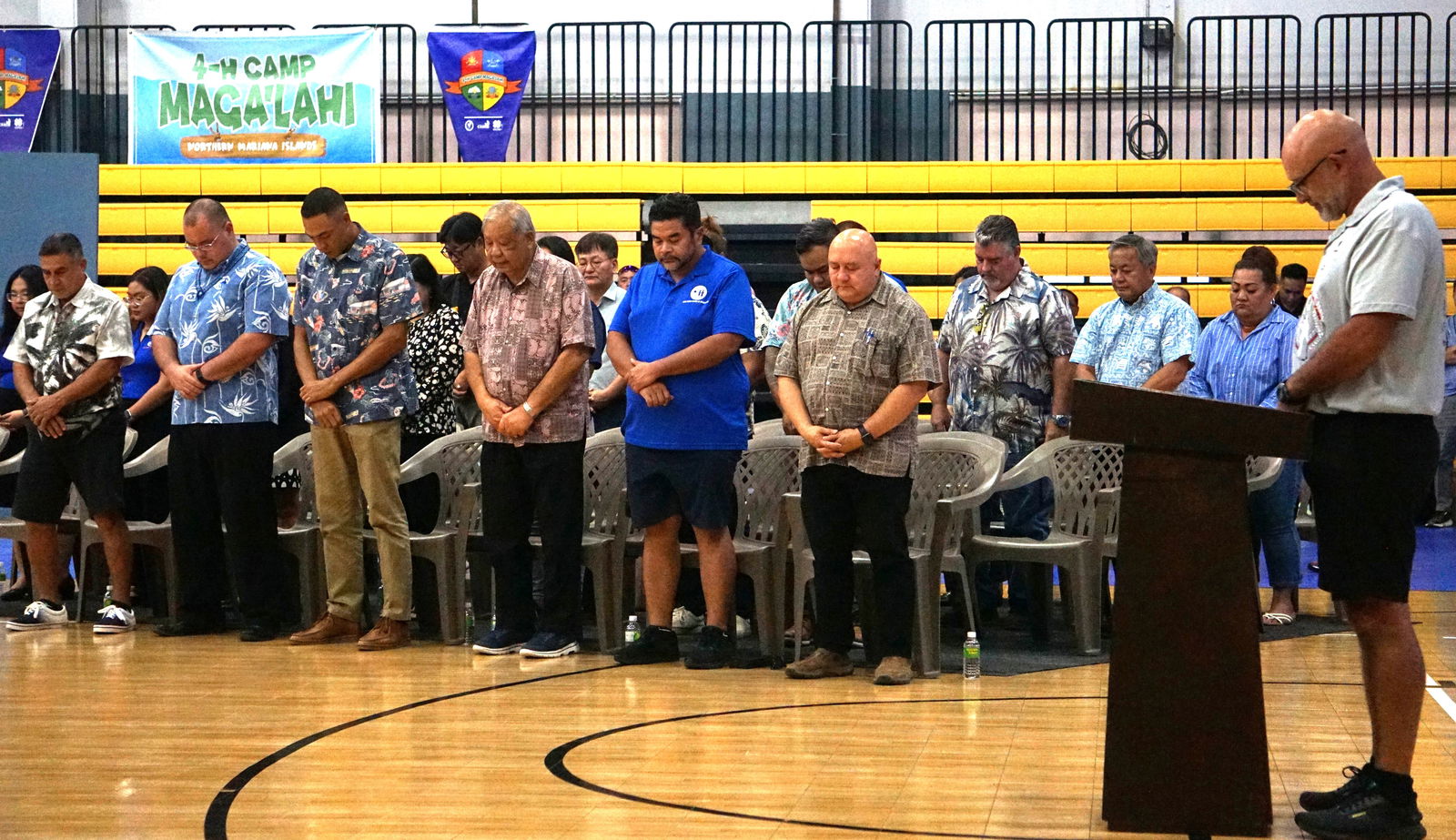 CNMI officials, led by Gov. David M. Apatang, along with NMSA board members and sponsors, observe a moment of silence in honor of the late Gov. Arnold I. Palacios.Photo by James F. Sablan Jr.