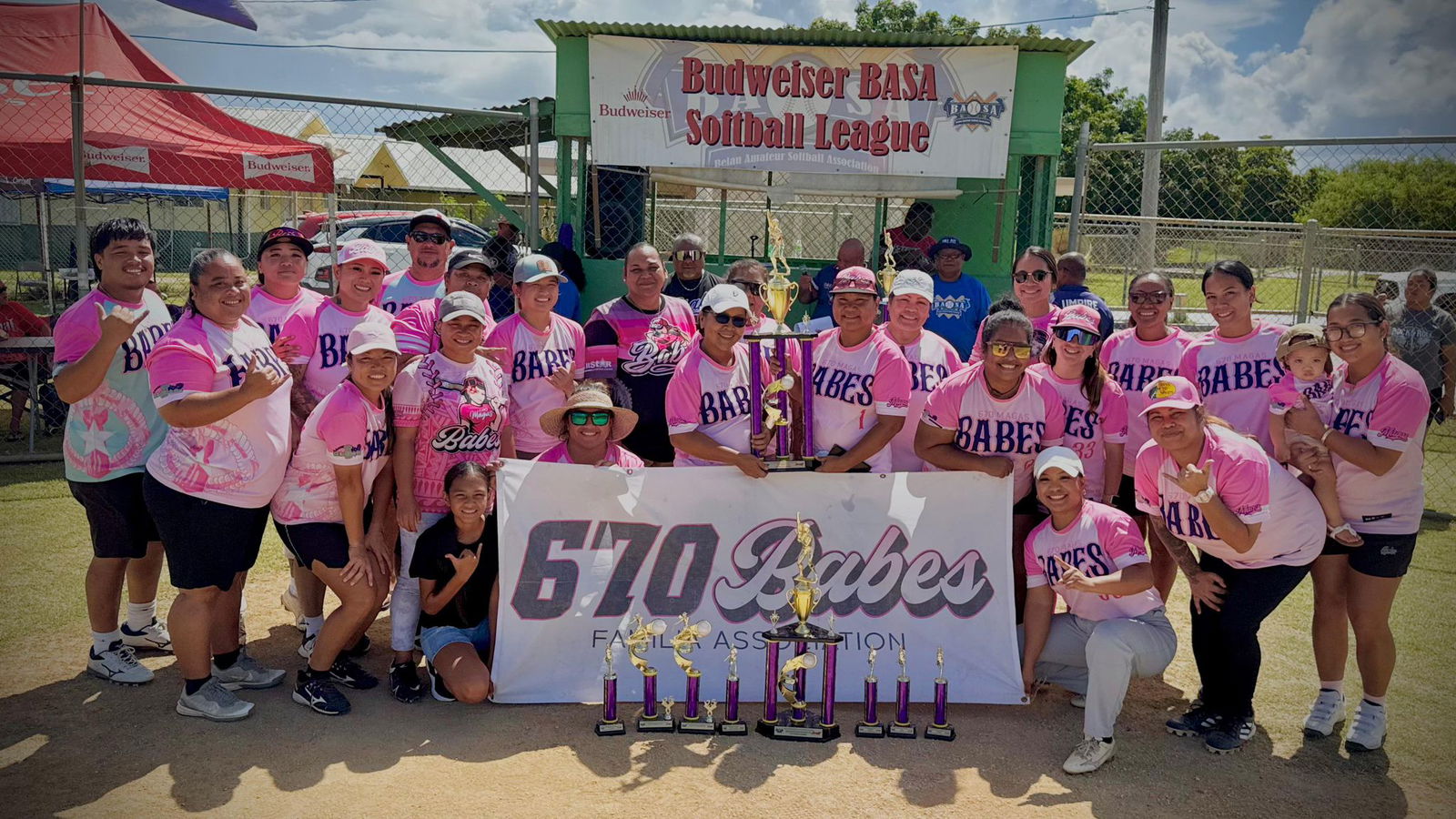 The 670 Magas Babes pose with their championship trophy and individual awards in the women's division of the 2025 Budweiser Belau Amateur Softball Association League at the Dandan ball field on Sunday.Contributed photo