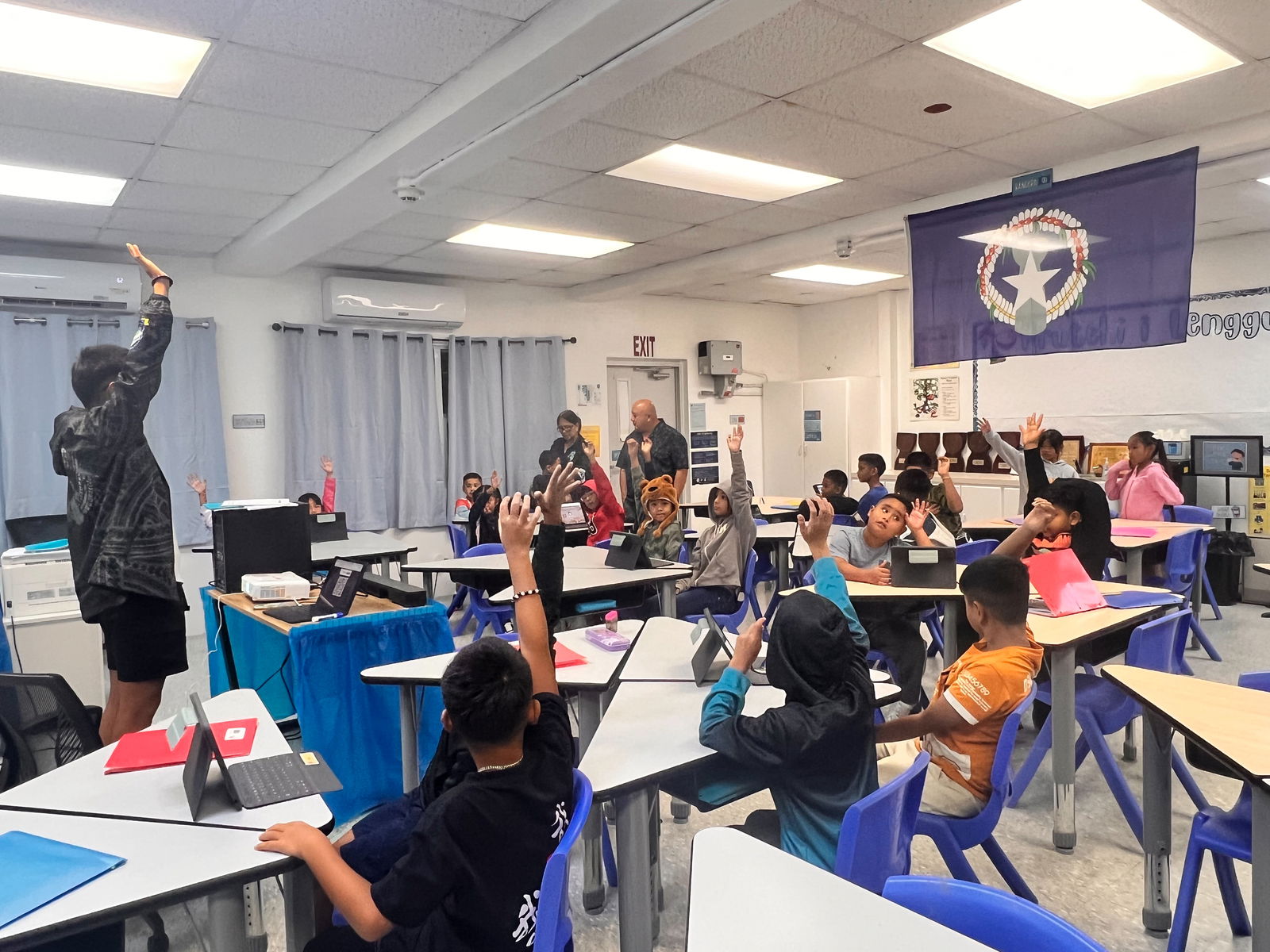 Students in Tommy Mendiola’s third-grade Chamorro-Carolinian Language and Heritage Studies immersion class welcomed Commissioner of Education Dr. Lawrence F. Camacho in the vernacular.