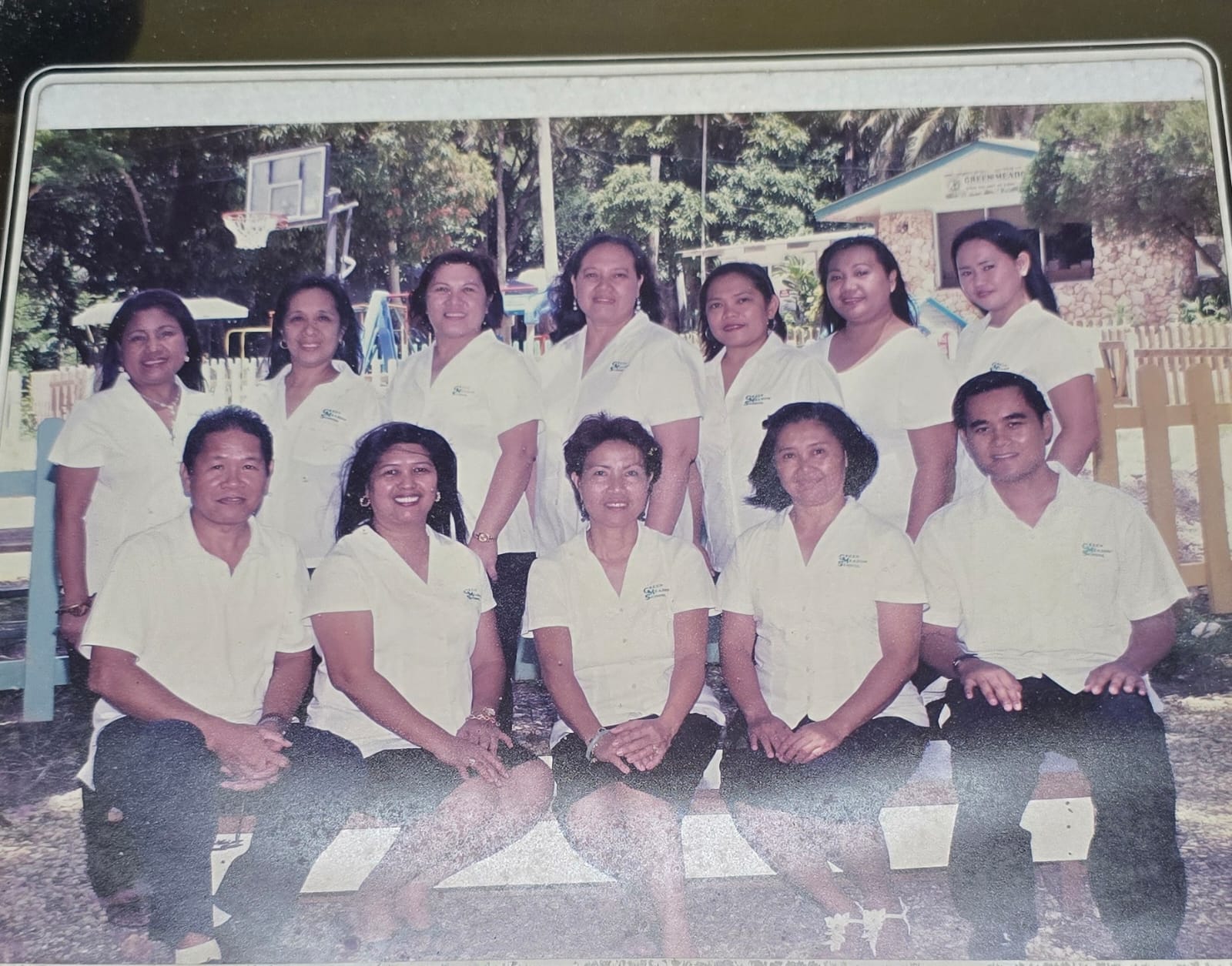 File photo shows, standing from left, Pure Love Daycare’s pioneering staff members: Ellen Alejo, Beth Capili, Sony Natividad, Myrna, Bona Angeles, Loida Mallari and Shirley Salilin, joining Principal Marilyn Divino, co-founder Mila Songcuan, and staffers Joy Chapap and Manuel Castro.