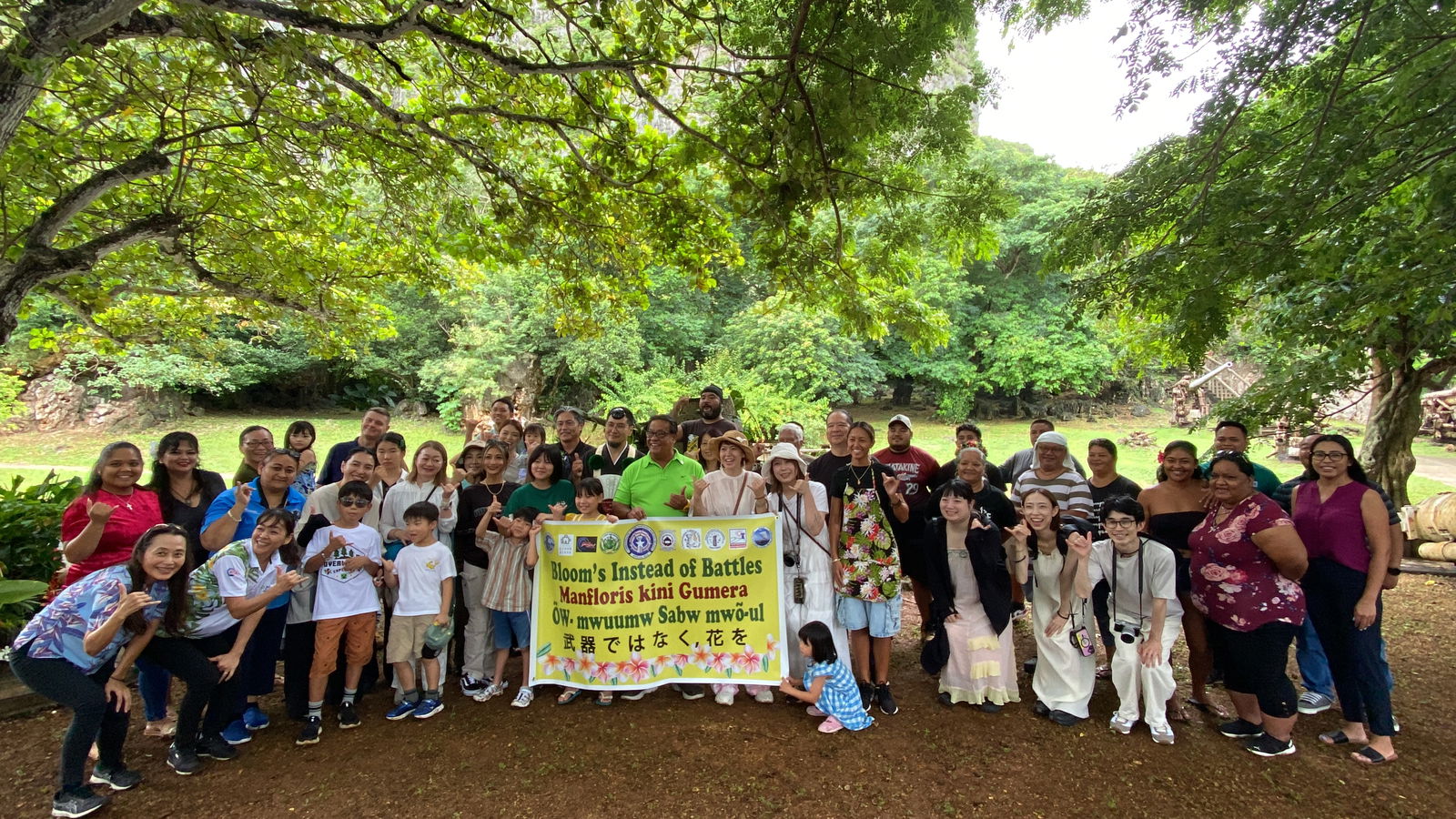 Saipan Mayor RB Camacho and other participants say “Hafa adai!” as they pose for a group photo.