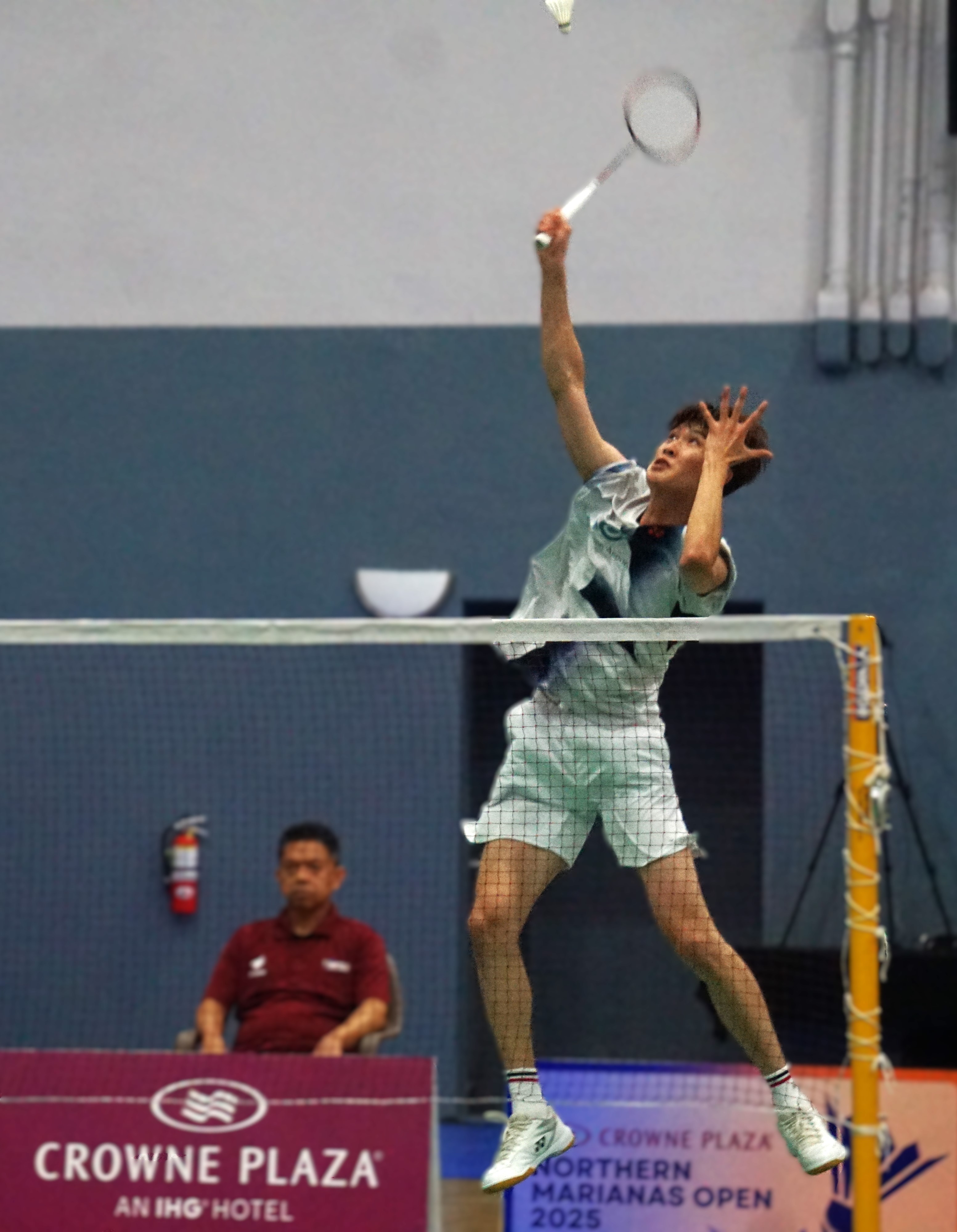 South Korea's Hae Duen Kim reaches out for the smash return during the title match against Japan's Yudai Okimoto in the Men's Singles event of the Crowne Plaza Northern Marianas Open 2025 at the Ada gym on Sunday.