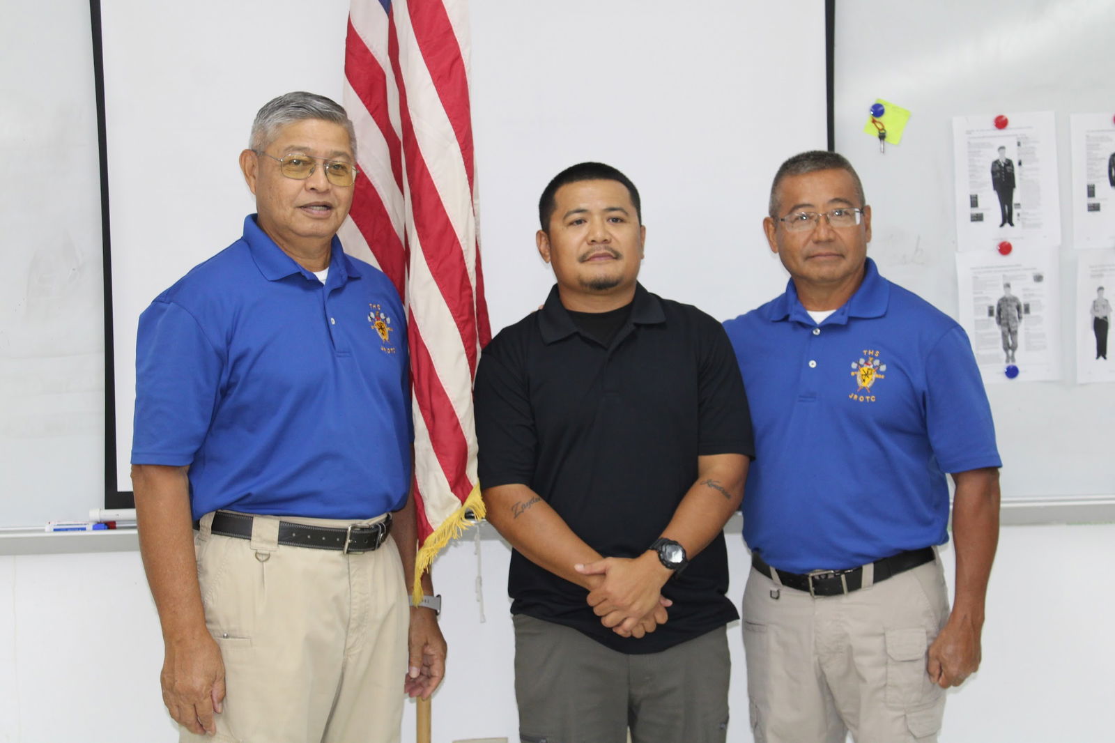 Gerald Mundo with JROTC instructors Captain Santos and 1SG King after his swearing in.Photo by C/2LT Juris Cabarles