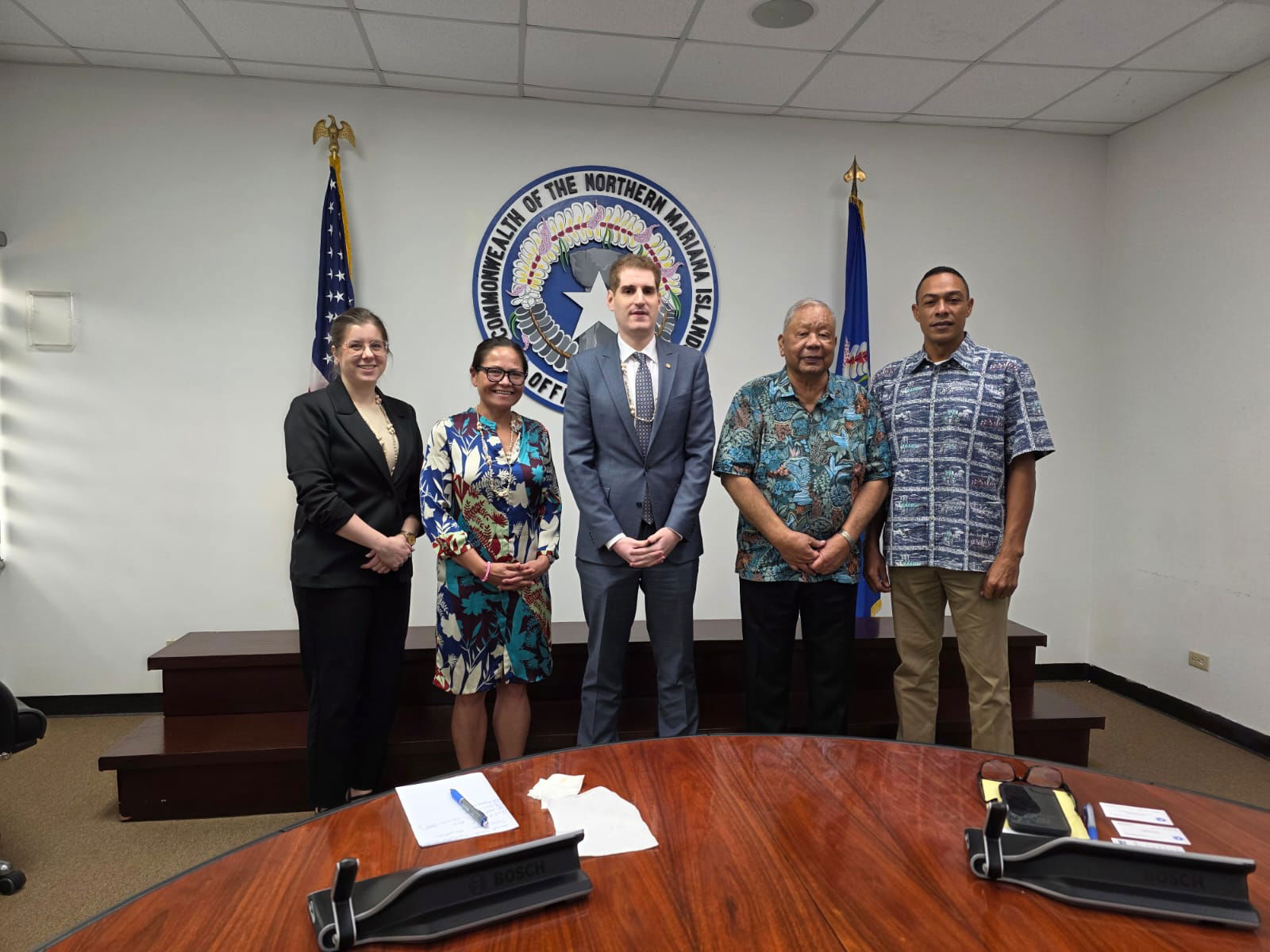 U.S. Department of Transportation Deputy Assistant Secretary for Aviation and International Affairs Jared Smith, center, Gov. David M. Apatang, second right, Lt. Gov. Dennis James Mendiola, right, U.S. Congresswomen Kimberlyn King-Hinds, second left, and USDOT Aviation and International Affairs Negotiations Division negotiator Tricia Kurbin, left,  pose for photo on Monday in the governor’s conference room. 