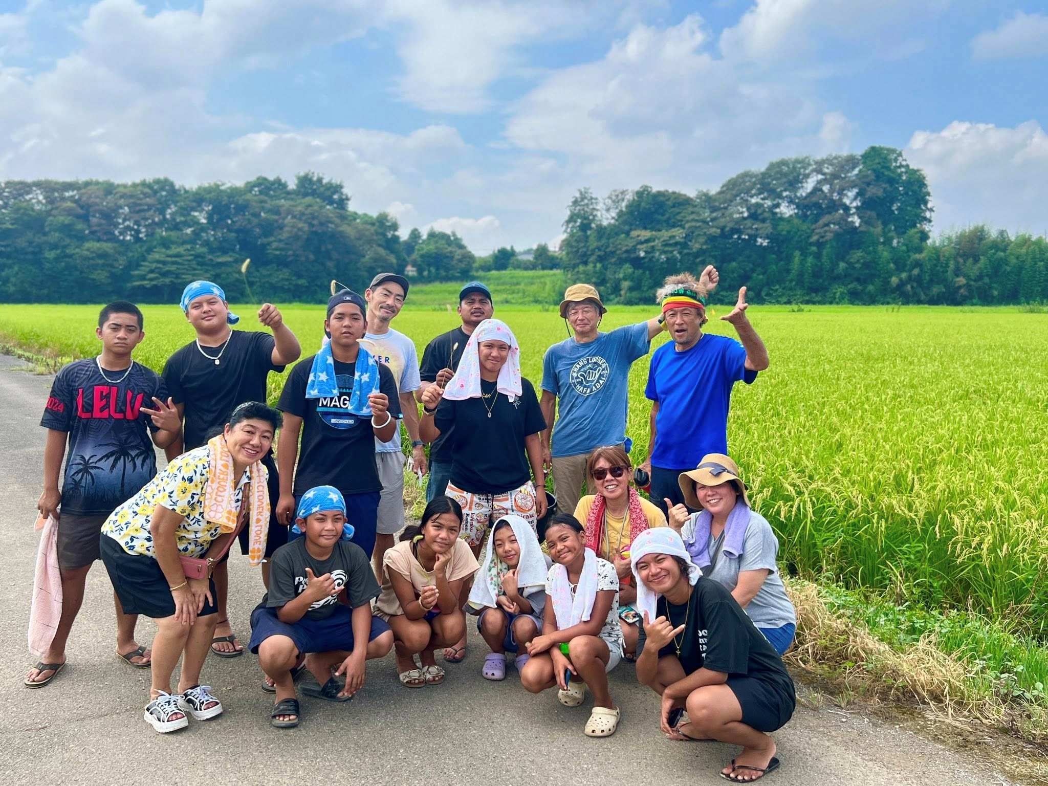 Saipan Awaodori founder and Kinpachi Restaurant president Misako Kamata joins the team at an edamame farm.