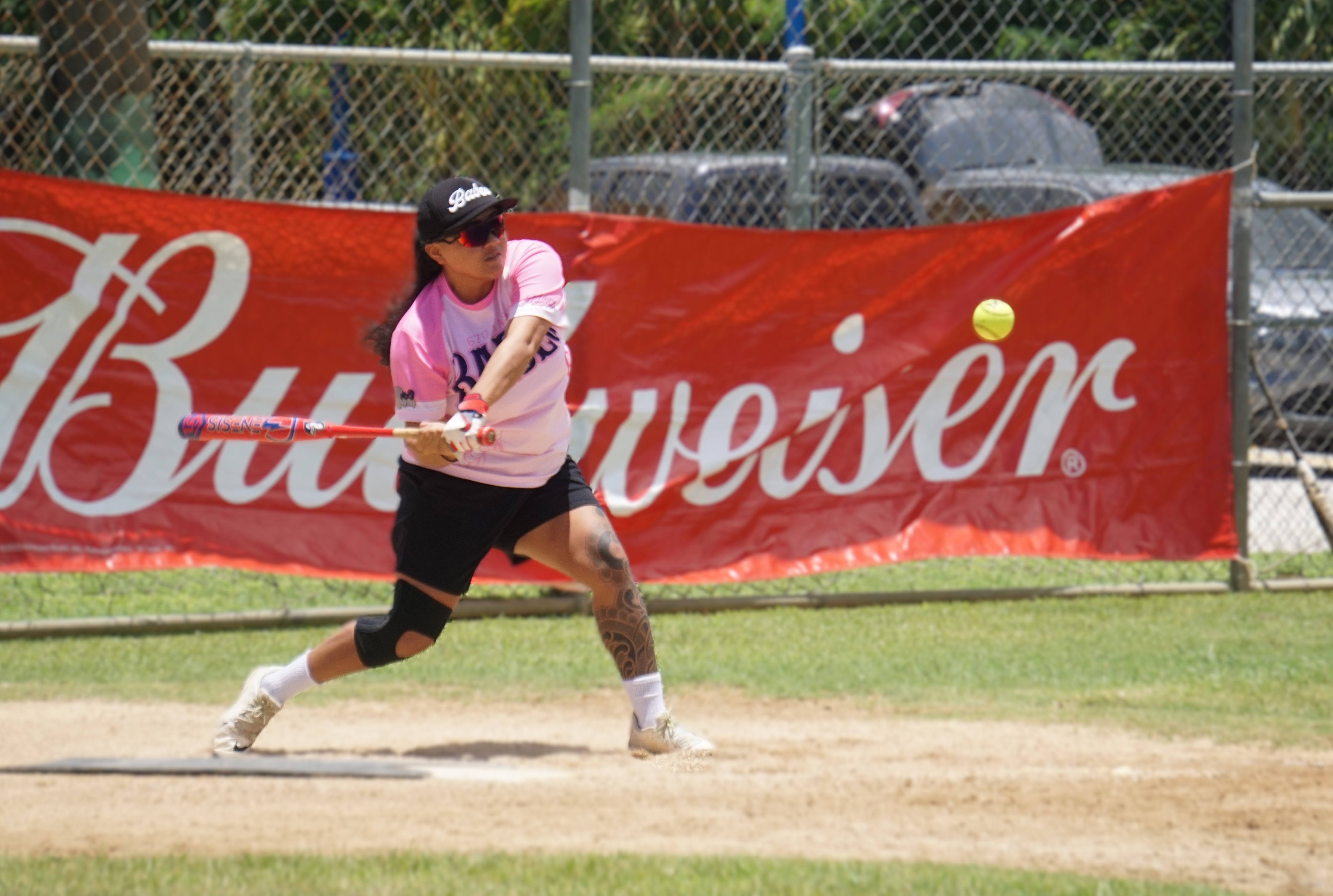 670 Magas Babes’ Cat Dela Cruz swings and connects for a single during a playoff game against Wettz in the women’s division of the 2025 Budweiser Belau Amateur Softball League at the Dandan ball field on Sunday.
