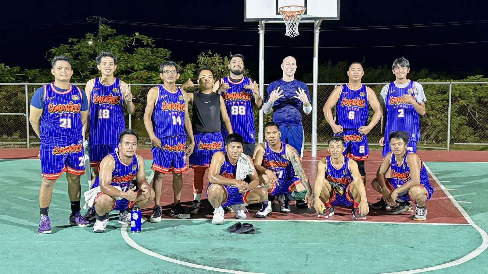 The Compadres pose for a group photo after earning their fourth straight win in the E-Sports CNMI Invitational Basketball League 2025  at the Koblerville basketball court.Contributed photo