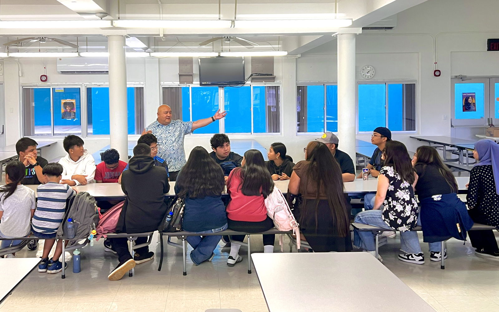 Commissioner of Education Dr. Lawrence F. Camacho gestures as he meets with Rota student leaders representing every middle school and high school grade level.  