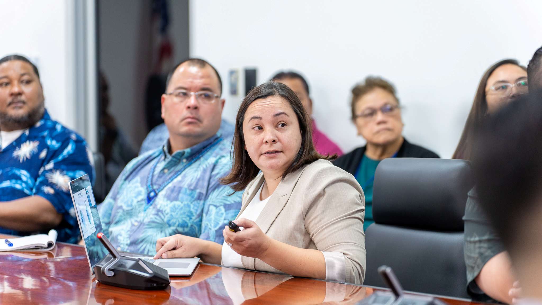 Marianas Visitors Authority Managing Director Jamaika Taijeron makes presentation during the meeting with visiting U.S. Department of Transportation Deputy Assistant Secretary Jared Smith in the governor's conference room on Capital Hill on Monday. Also in the photo are Speaker Edmund S. Villagomez and Senate President Karl King-Nabors.Office of the Governor photo