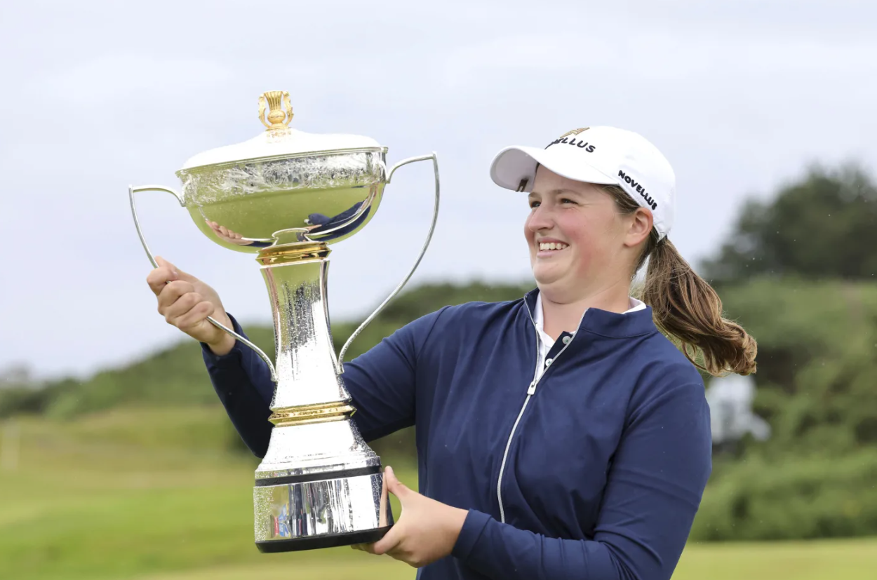 England’s Lottie Woad holds the trophy after winning the Women’s Scottish Open at the Dundonald Links in Irvine, Scotland on Sunday, July 27, 2025.AP