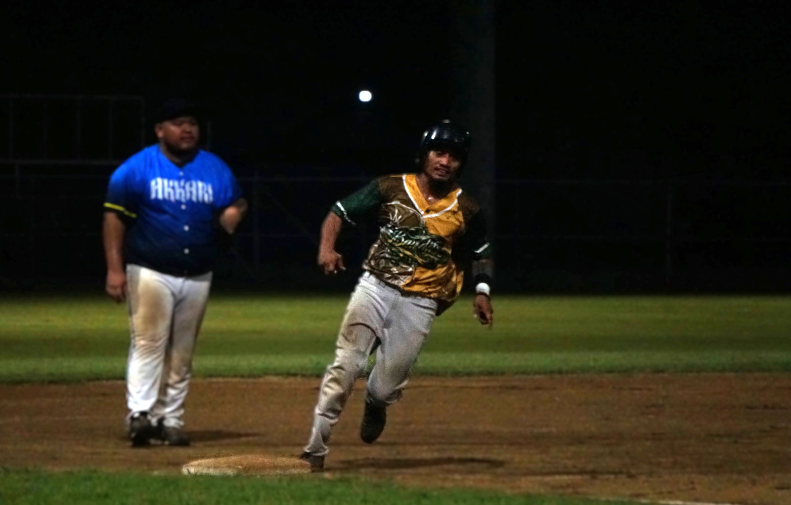 Bandits' John Welson makes his way home for a scored run during a Saipan Baseball League game at the Francisco "Tan Ko" Palacios Baseball Field on Wednesday night.